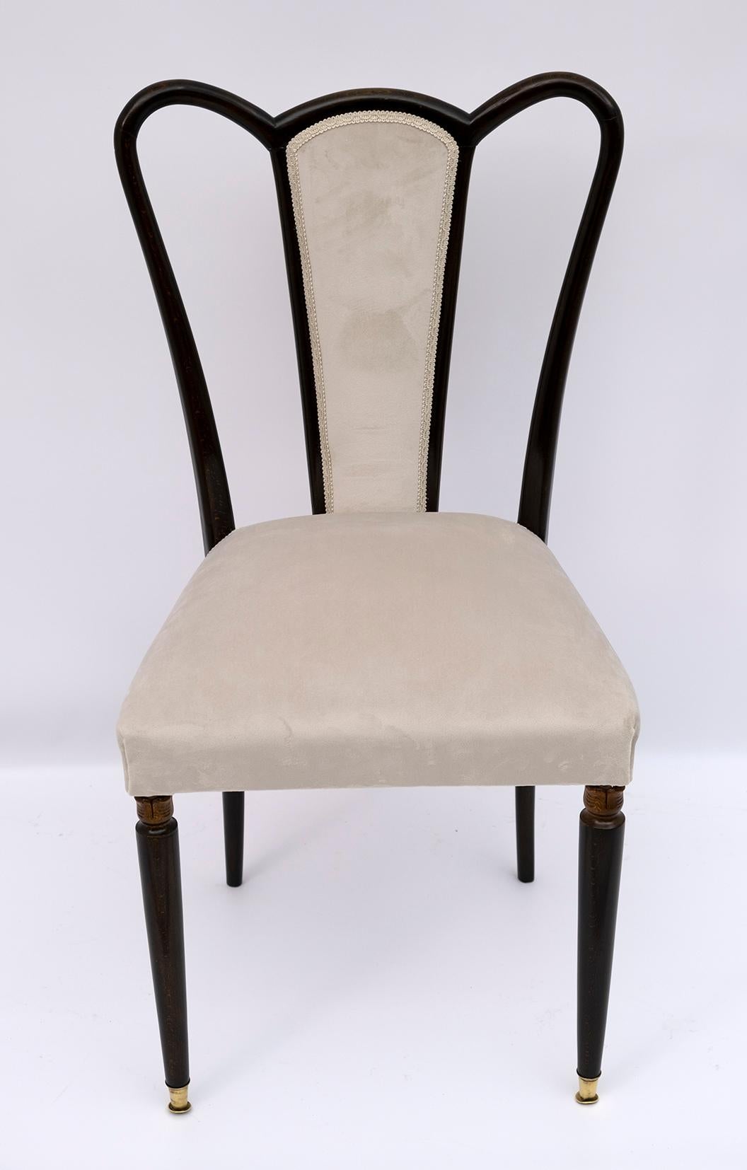 A chair designed by the well-known designer Guglielmo Ulrich and produced by Arredamenti Casa between the 1940s and 1950s. The chair has been restored and upholstered in cream colored velvet. The chair is in dark walnut-stained bent beech.

In