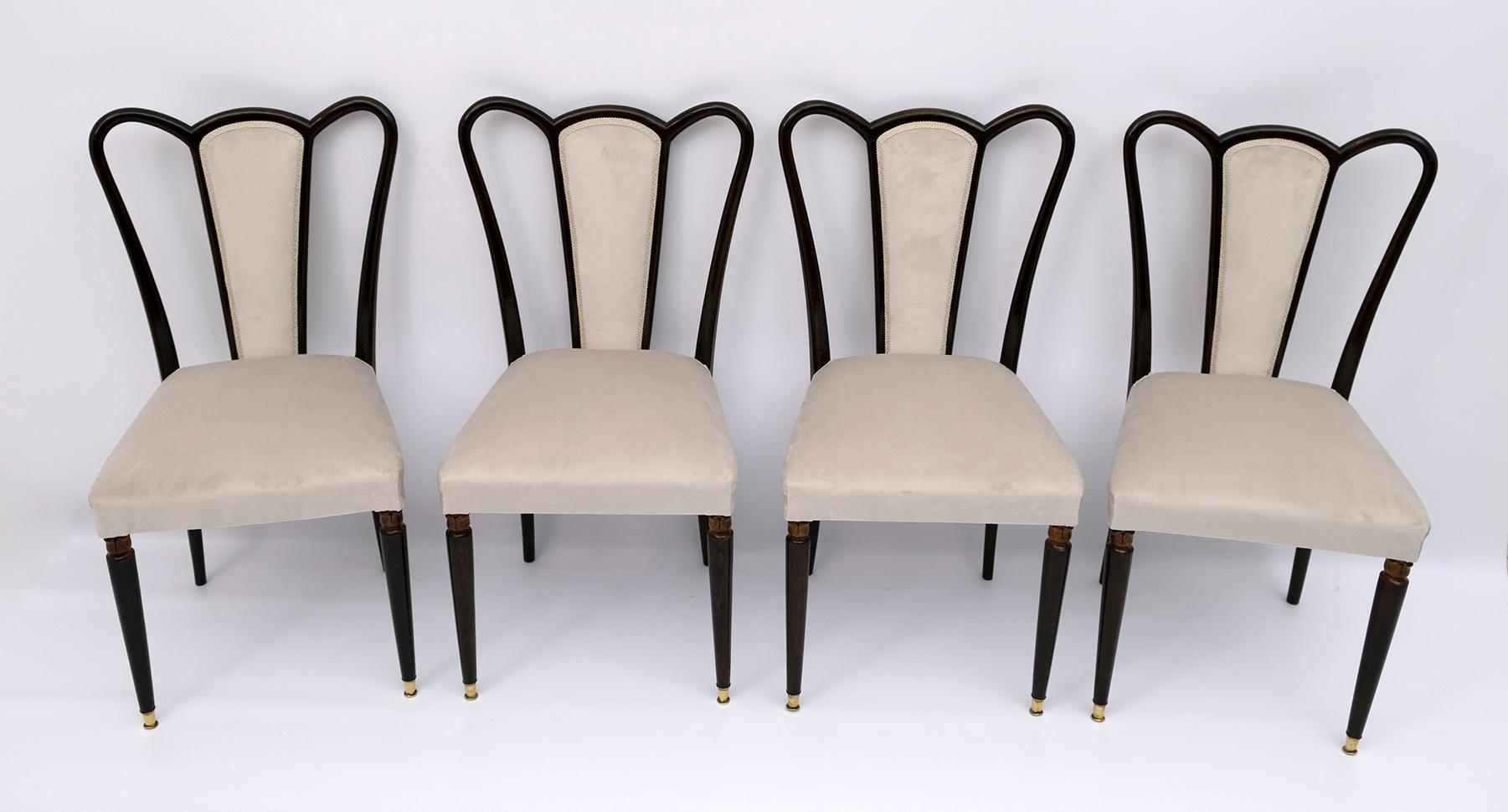 Four chairs designed by the well-known designer Guglielmo Ulrich and produced by Arredamenti Casa between the 1940s and 1950s. The chairs have been restored and upholstered in cream velvet. The chairs are in curved beech, dark walnut stained.

In