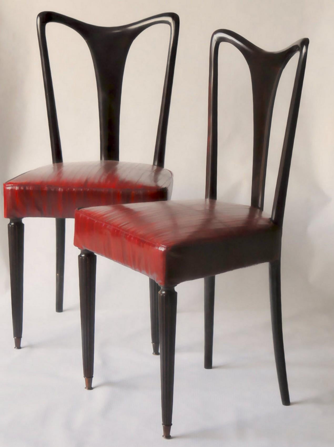 Rare set of six dining chairs. Back shows the outline that is commonly attributed to Guglielmo Ulrich.
There is a gorgeous carving on the curved top. It's not just following the outline of the back, but is scooped making a lip that witness high