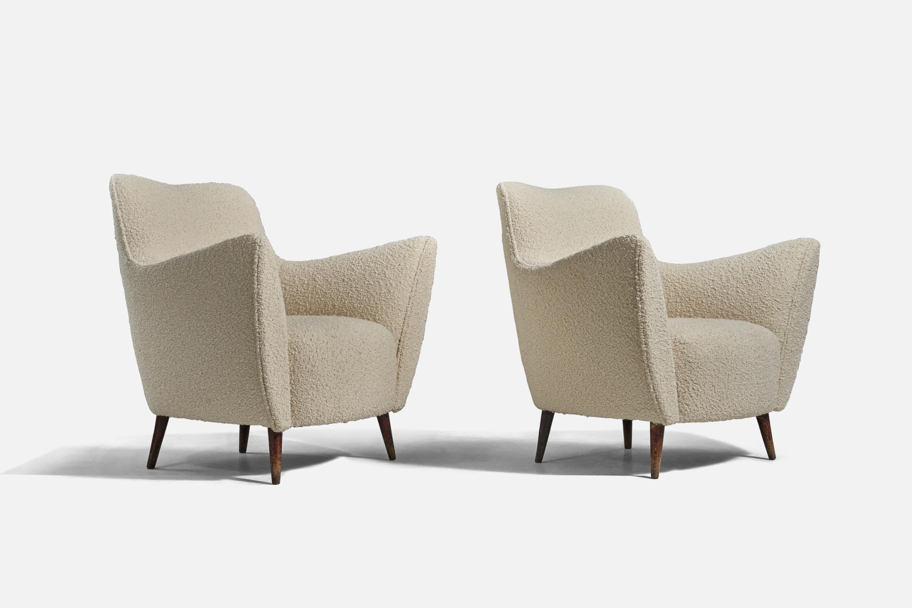 A pair of wood and white fabric lounge chairs designed by Guglielmo Veronesi and produced by ISA Bergamo, Italy, 1950s.