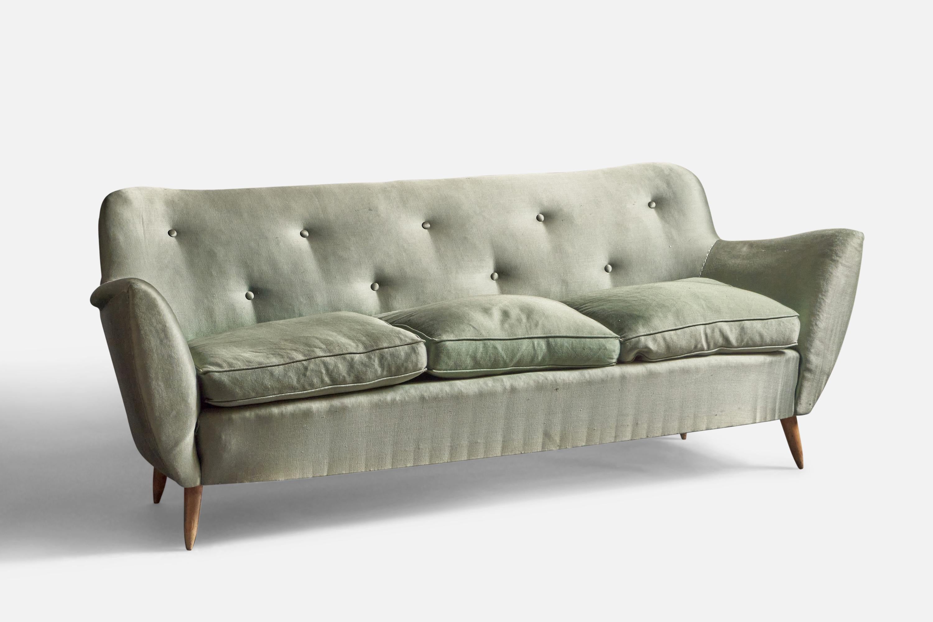 A green fabric and wood sofa, designed by Guglielmo Veronesi and produced in Italy, 1950s.