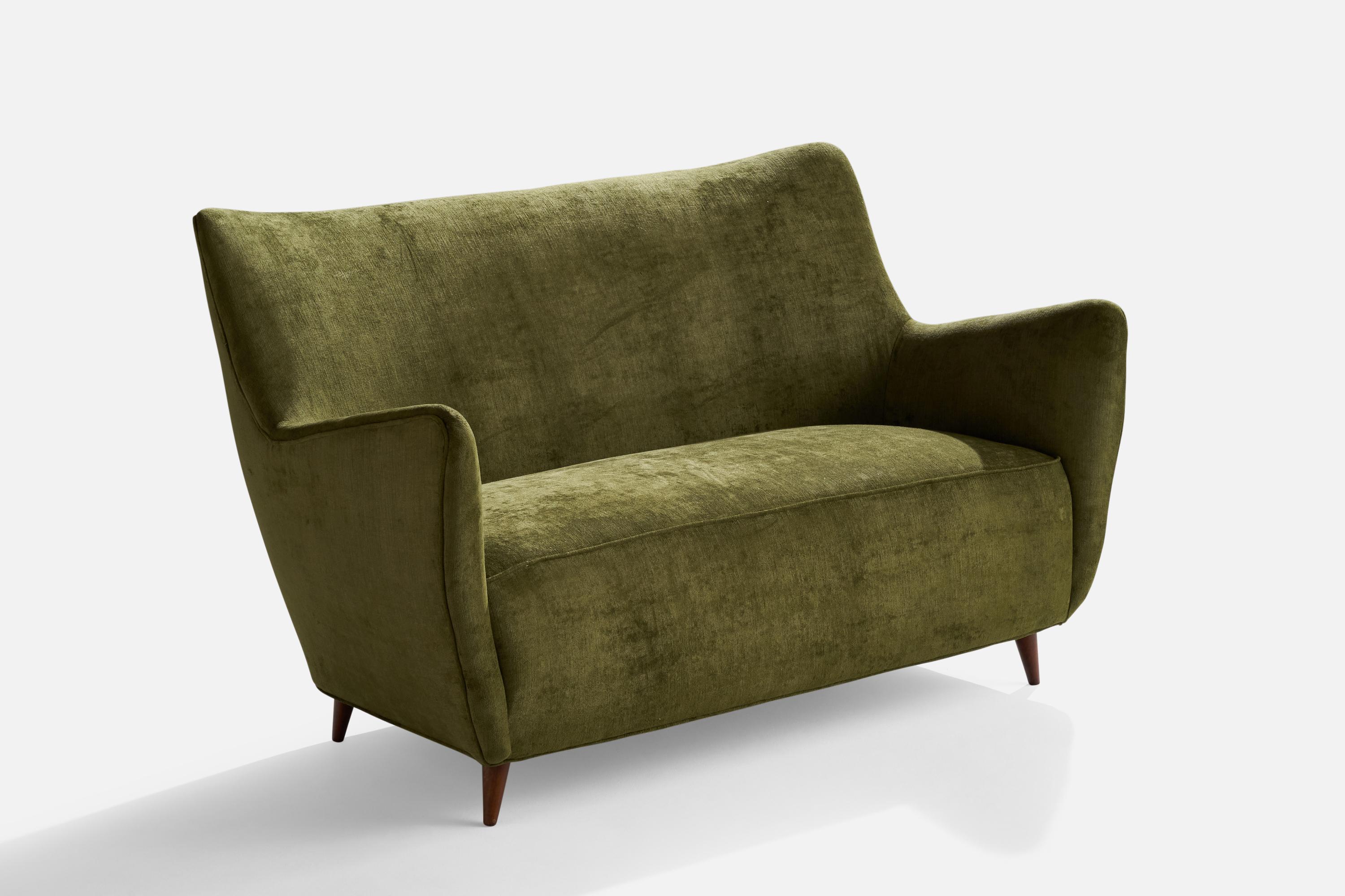 A green velvet and wood sofa or settee designed by Guglielmo Veronesi and produced by I.S.A Bergamo, Italy, 1950s.

Seat height 17.5”
