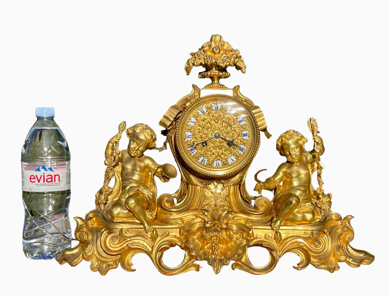 GUICHE Palais Royal - Gilt Bronze Clock with Puttis For Sale 8