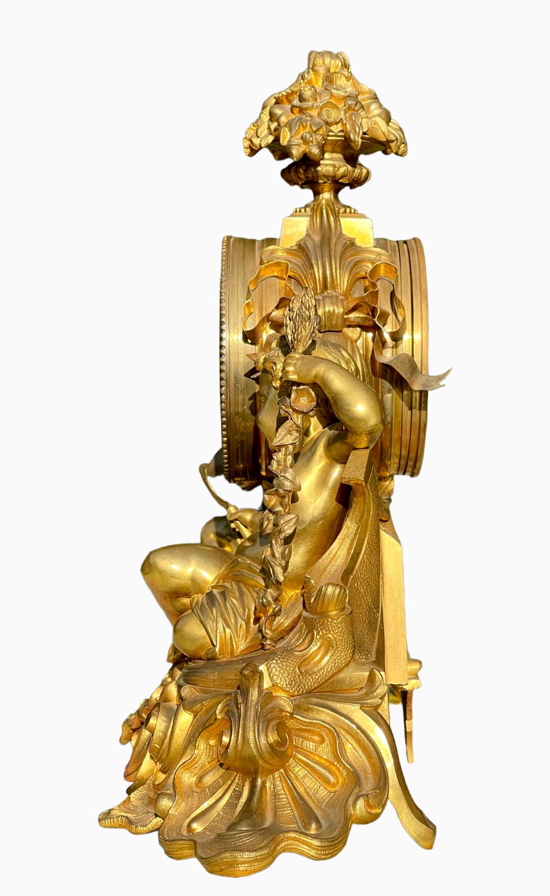 GUICHE Palais Royal - Gilt Bronze Clock with Puttis For Sale 9