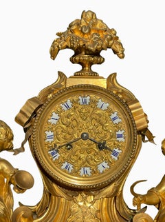 GUICHE Palais Royal - Gilt Bronze Clock with Puttis