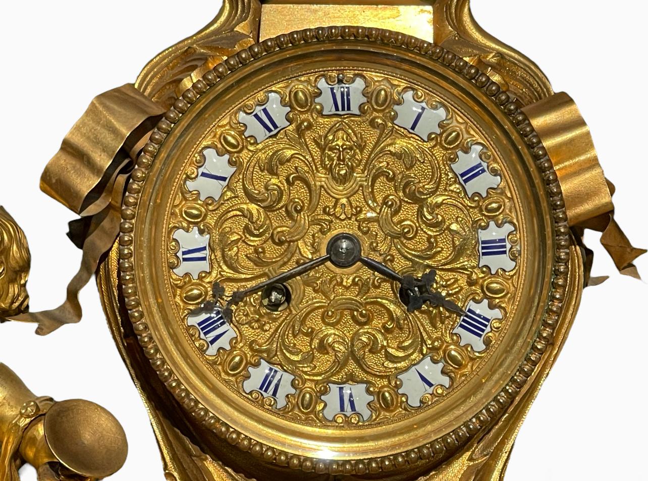 Napoléon III GUICHE Palais Royal - Horloge en bronze doré avec puttis en vente