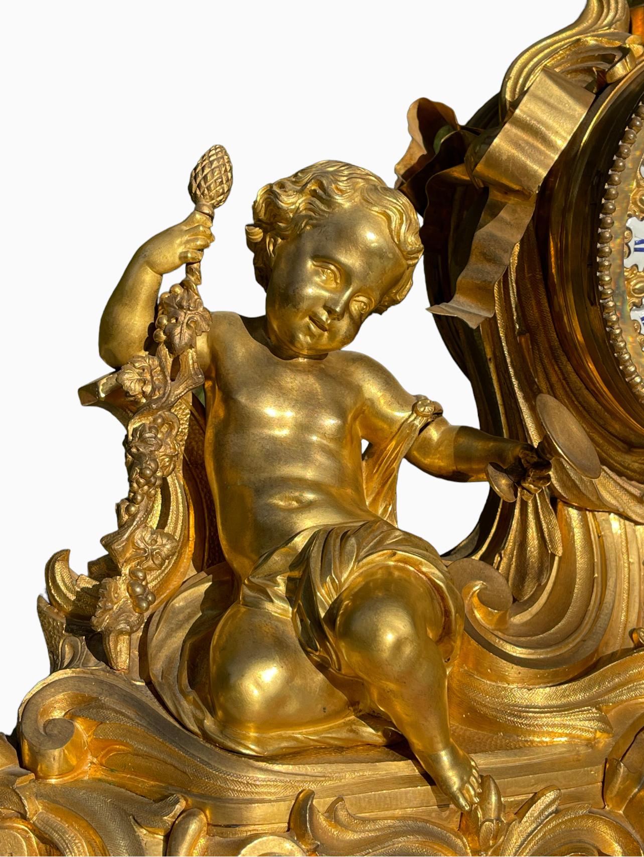 GUICHE Palais Royal - Horloge en bronze doré avec puttis en vente 1