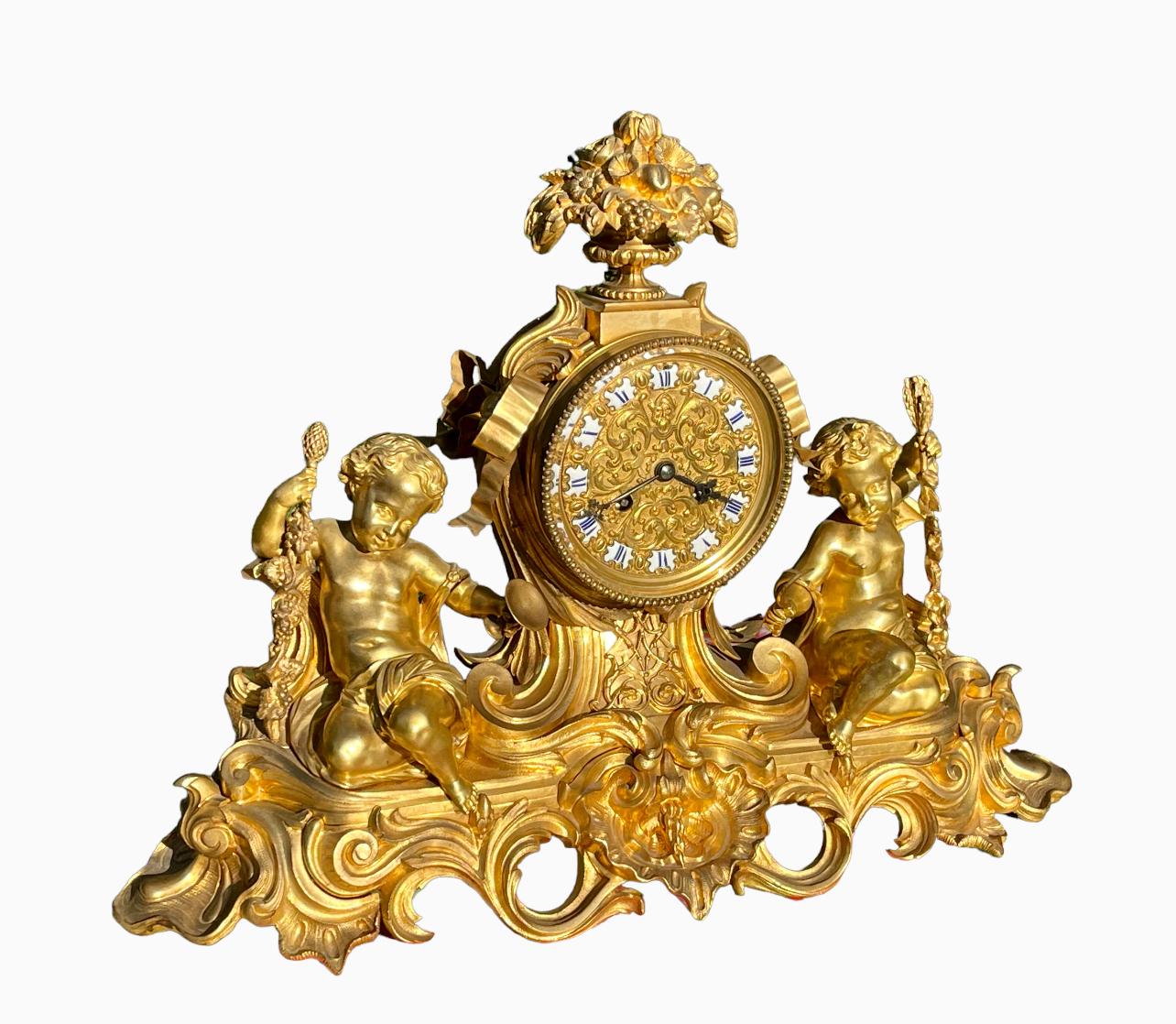 GUICHE Palais Royal - Gilt Bronze Clock with Puttis For Sale 3