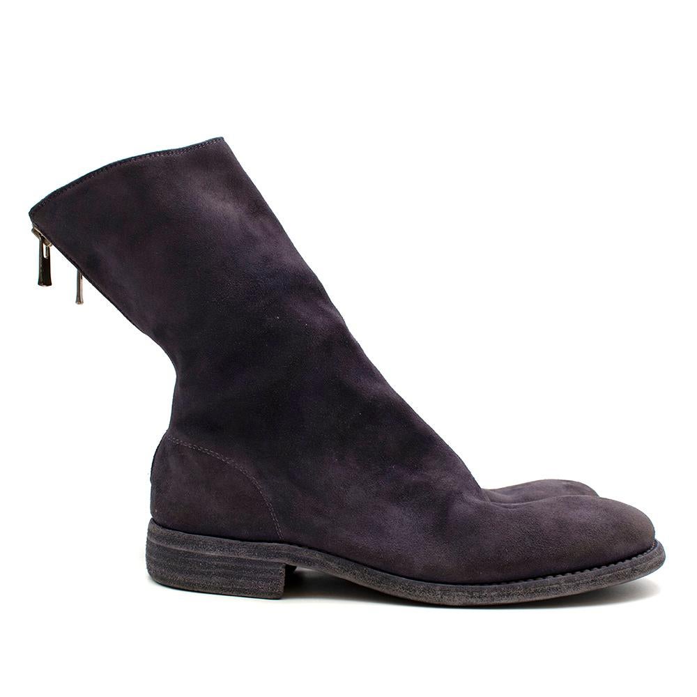 Guidi Suede Distressed Zipped Boots

- Classic back zipped boots in suede with silver hardware
- Features stacked sole construction
- Distressed & exposed sole look
- This item fits small
- 1/4 length boot 
- Round toes


Made in Italy

Fabric