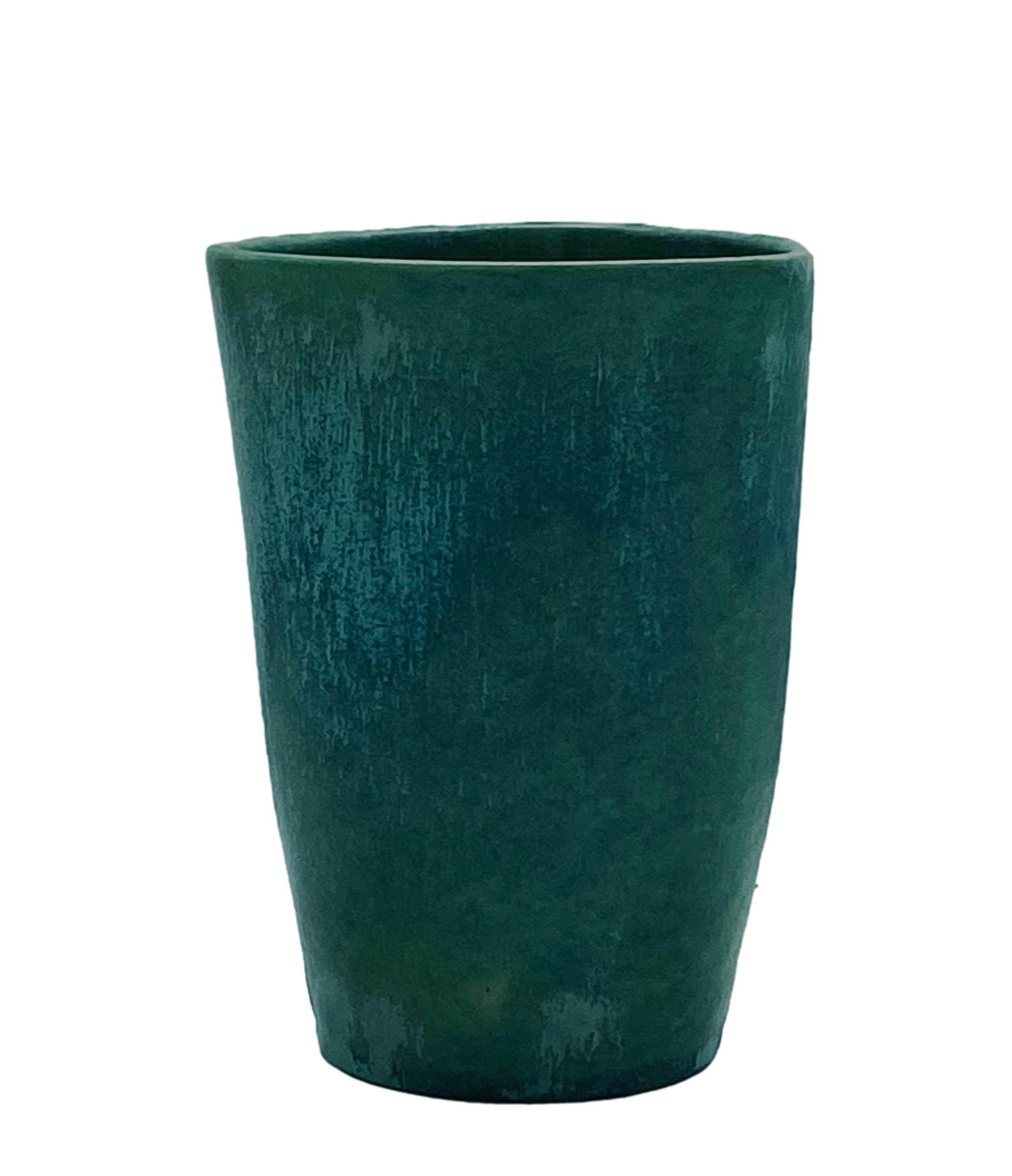 Small earthenware vase modelled by casting and glazed in matt green, by Guido Andlovitz for Societa'ceramica italiana Lavenia 1950. Mark under the base.
 