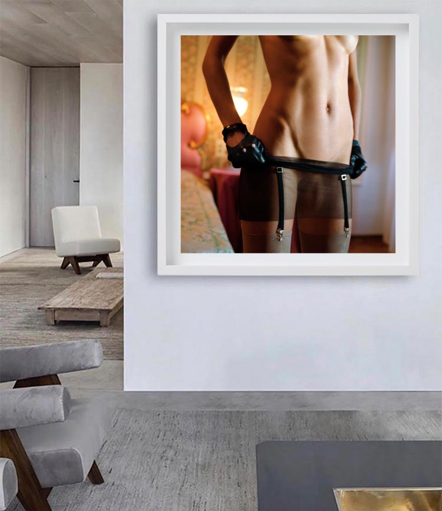 'Belly and black Garderbelt' - seminude in hotelroom, fine art photography, 2014 - Photograph by Guido Argentini