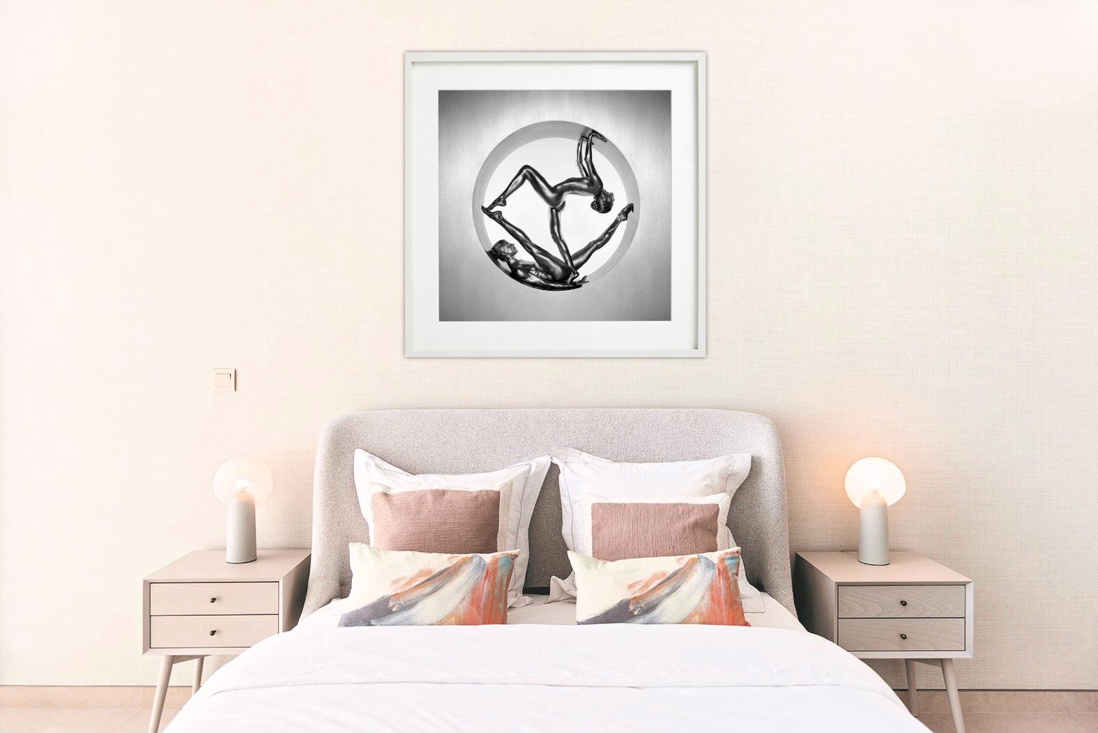 Acrobatic Nude in Silver Paint, photographed by Guido Argentini in 1995.

All prints are limited edition. Available in multiple sizes. High-end framing on request.

All prints are done and signed by the artist. The collector receives an additional