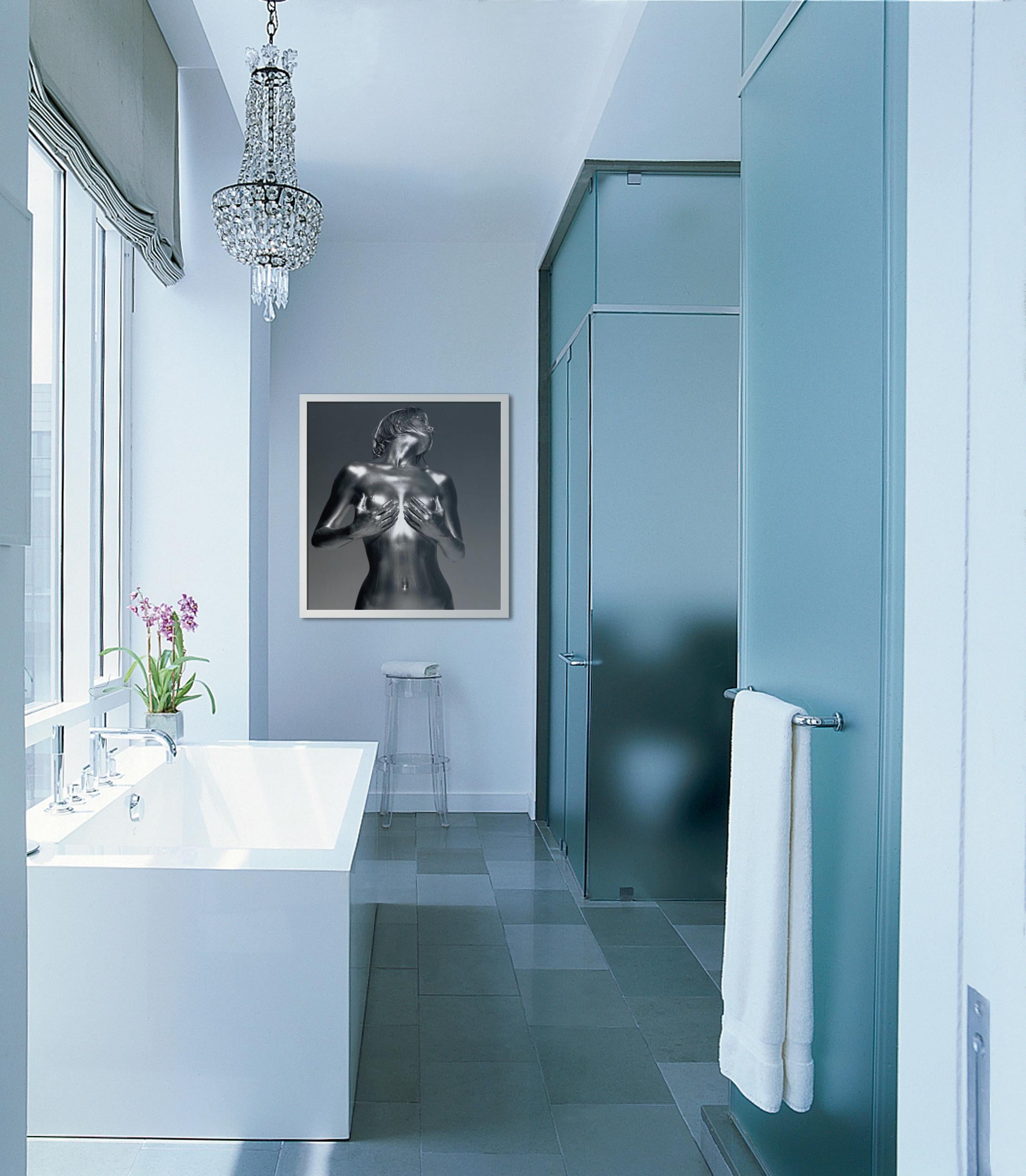 Half body nude in silver paint, photographed by Guido Argentini in 2002.

All prints are limited edition. Available in multiple sizes. High-end framing on request.

All prints are done and signed by the artist. The collector receives an additional