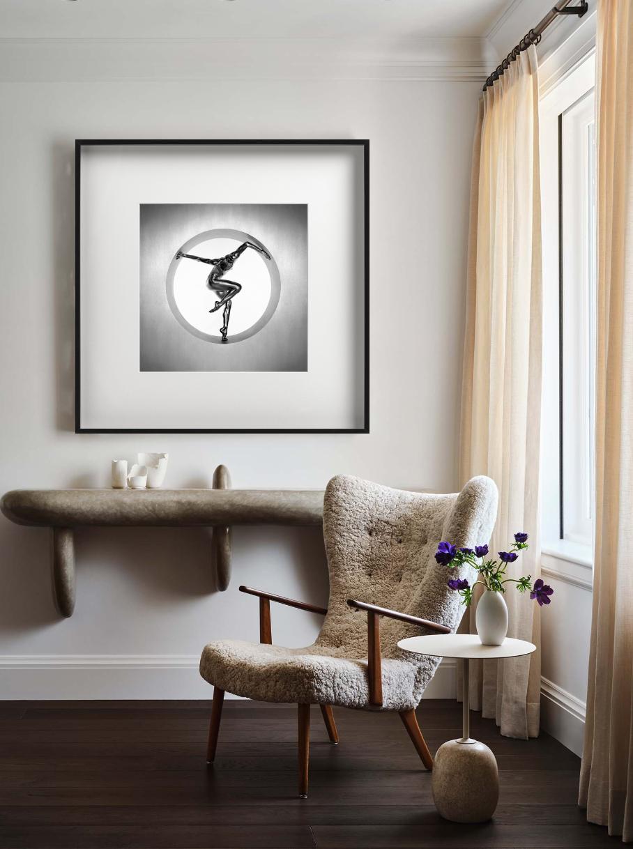 Nemesis depicts a nude model covered in silver paint in a symmetric, acrobatic pose, photographed by Guido Argentini.

All prints are limited edition. Available in multiple sizes. High-end framing on request.

All prints are done and signed by the