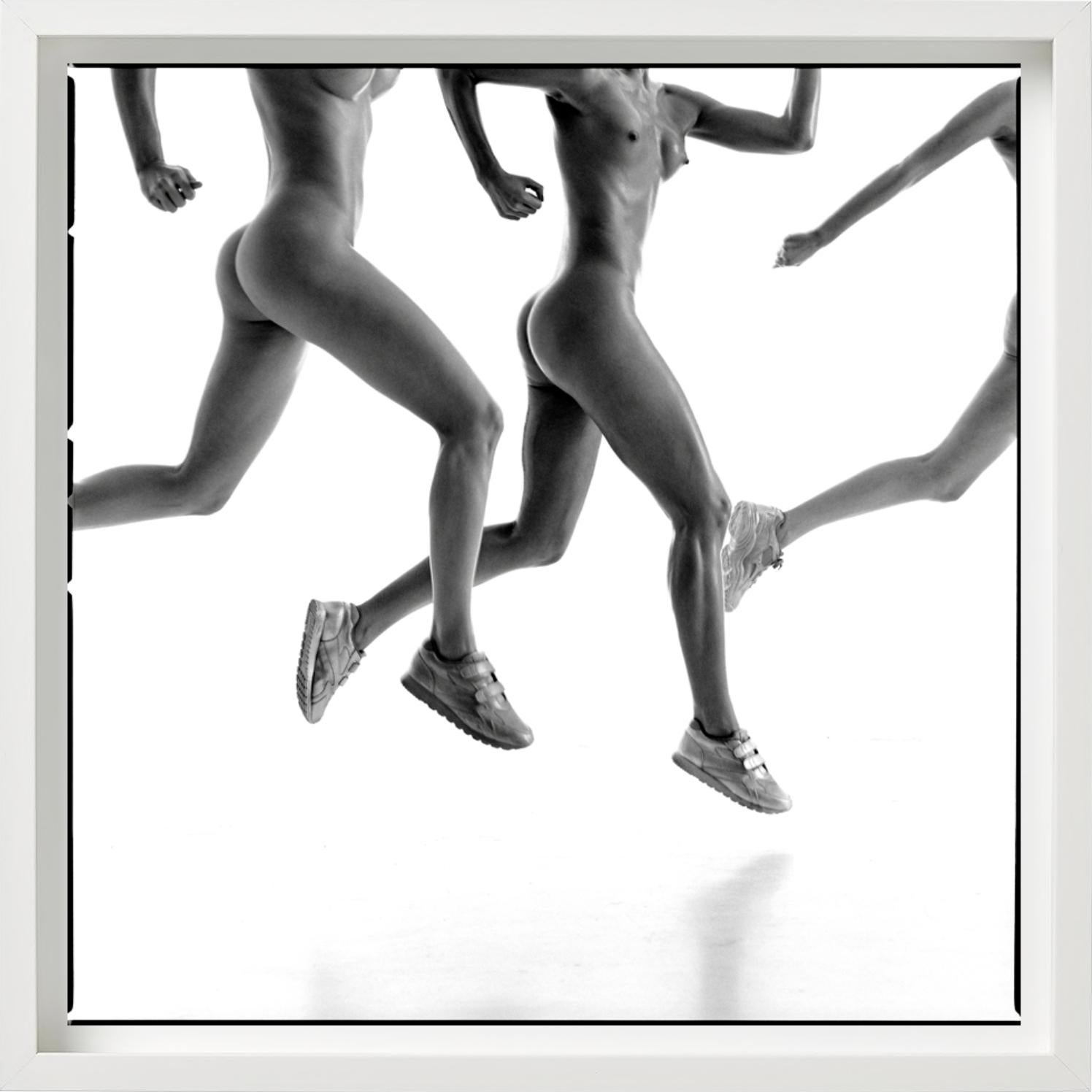 Olympic, Three Girls running - nude athletes running, fine art photography - Photograph by Guido Argentini