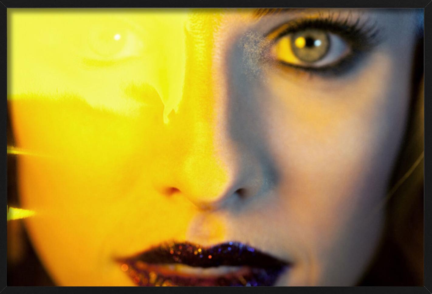 Sydney's yellow eyes - portrait of the face of a beautiful woman - Beige Color Photograph by Guido Argentini