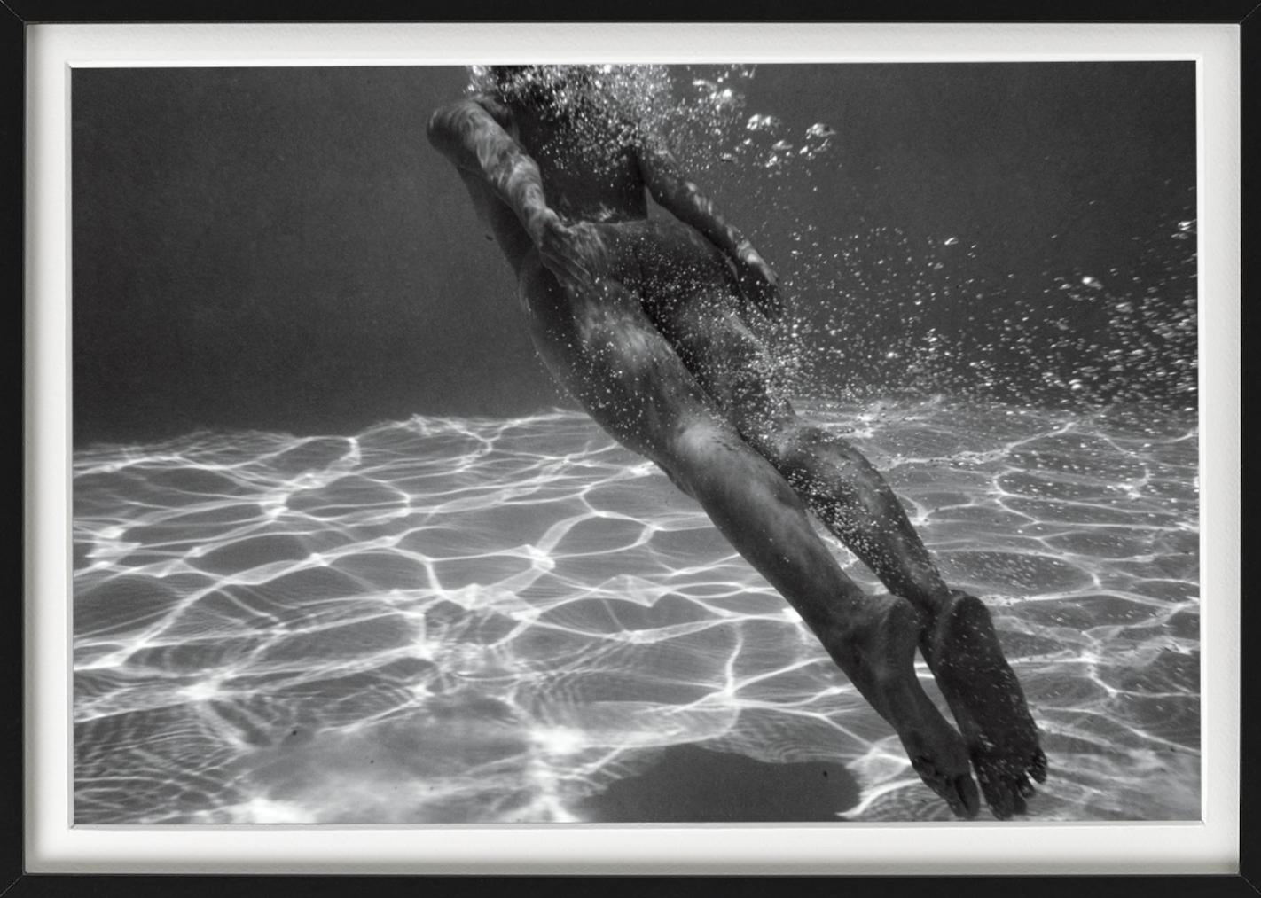 Tove Underwater - Underwater Nude Swimming Woman in the Water - Photograph by Guido Argentini