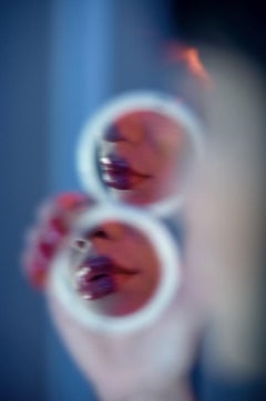 Untitled #130 - red lips reflected in a pocket mirror, fine art photography 2024