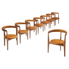 Guido Canali ensemble de huit chaises de salle à manger rares en noyer et cuir cognac
