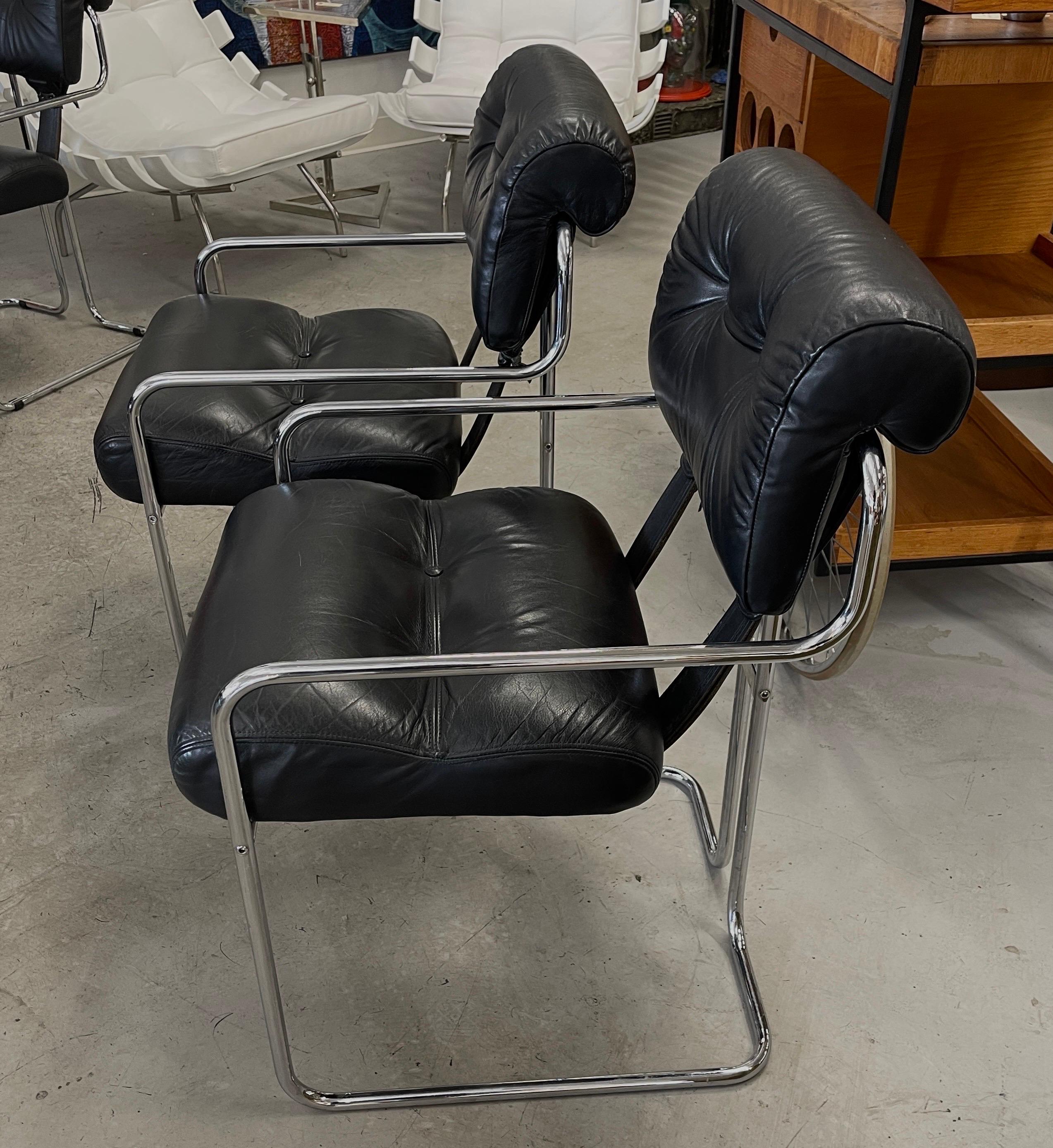 A beautiful pair of i4 Mariani Pace Tucroma leather and chrome chairs designed by Guido Faleschini. They are both labeled underneath. In good vintage condition and extremely comfortable. The leather is in good condition although they show some minor
