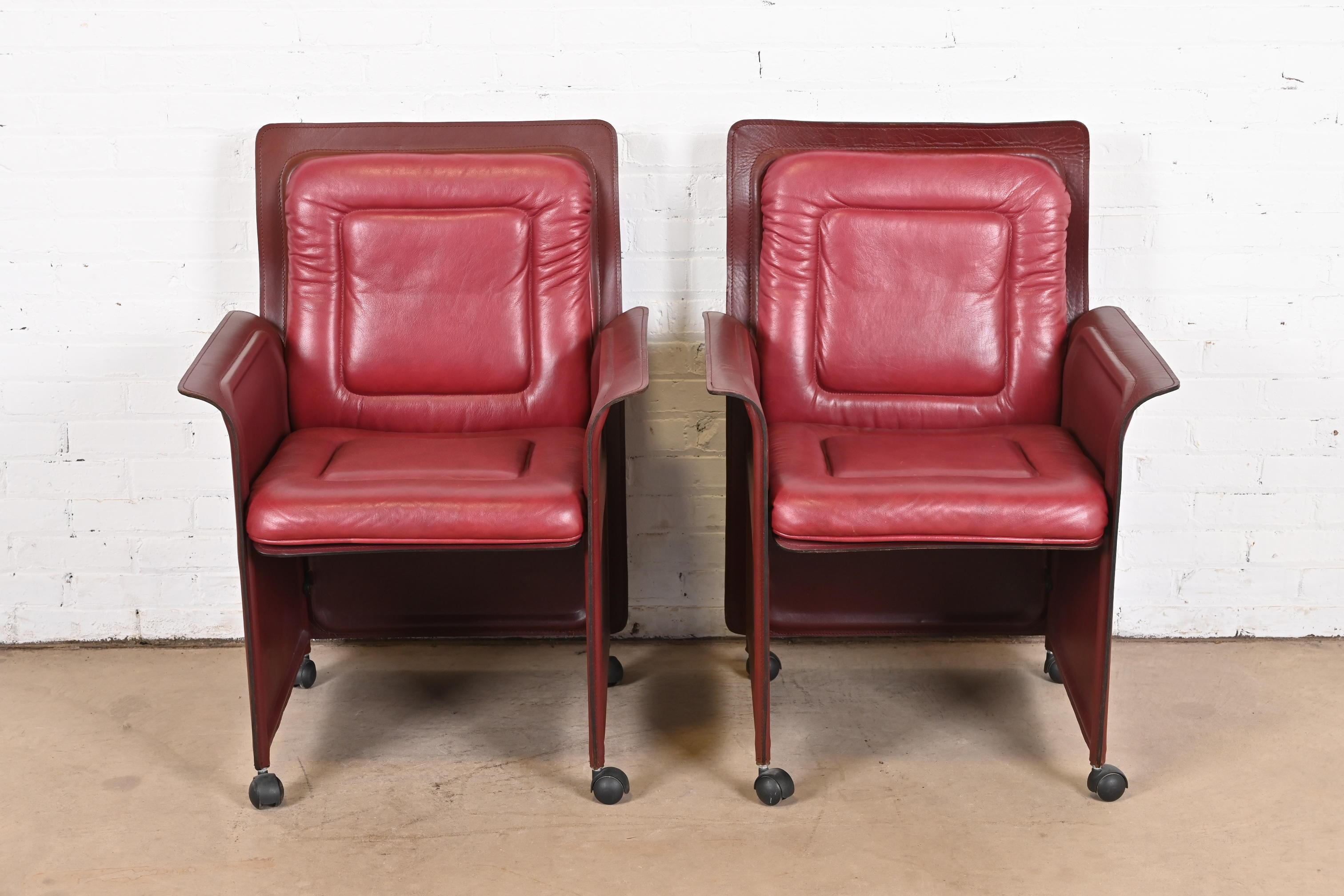 A gorgeous pair of Postmodern or Mid-Century Modern style leather wrapped armchairs, club chairs, or lounge chairs

By Guido Faleschini for i4 Mariani, 
