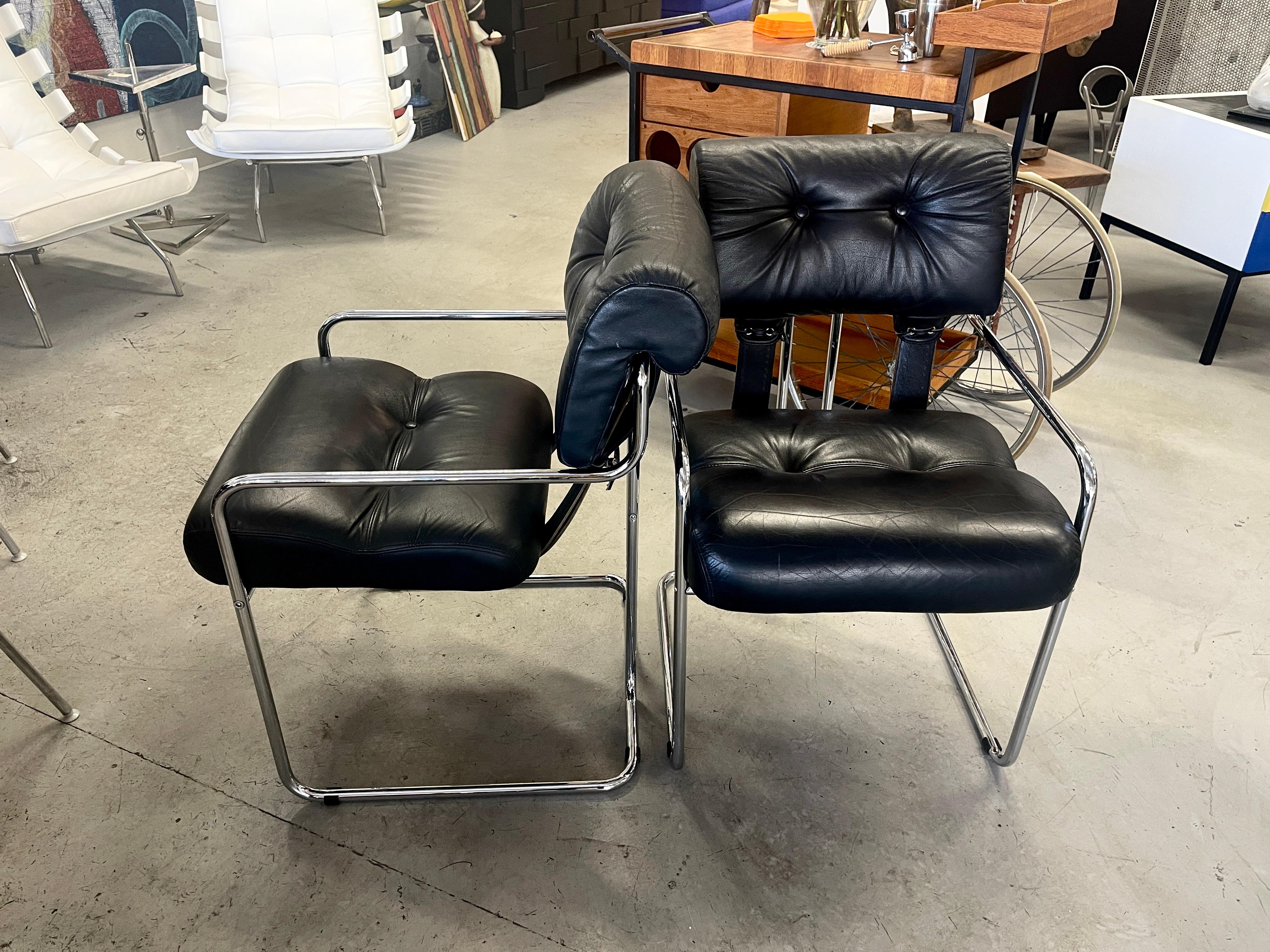 A beautiful pair of i4 Mariani Pace Tucroma leather and chrome chairs designed by Guido Faleschini. They are both labeled underneath. In good vintage condition and extremely comfortable. The leather is in good condition with some minor marks please