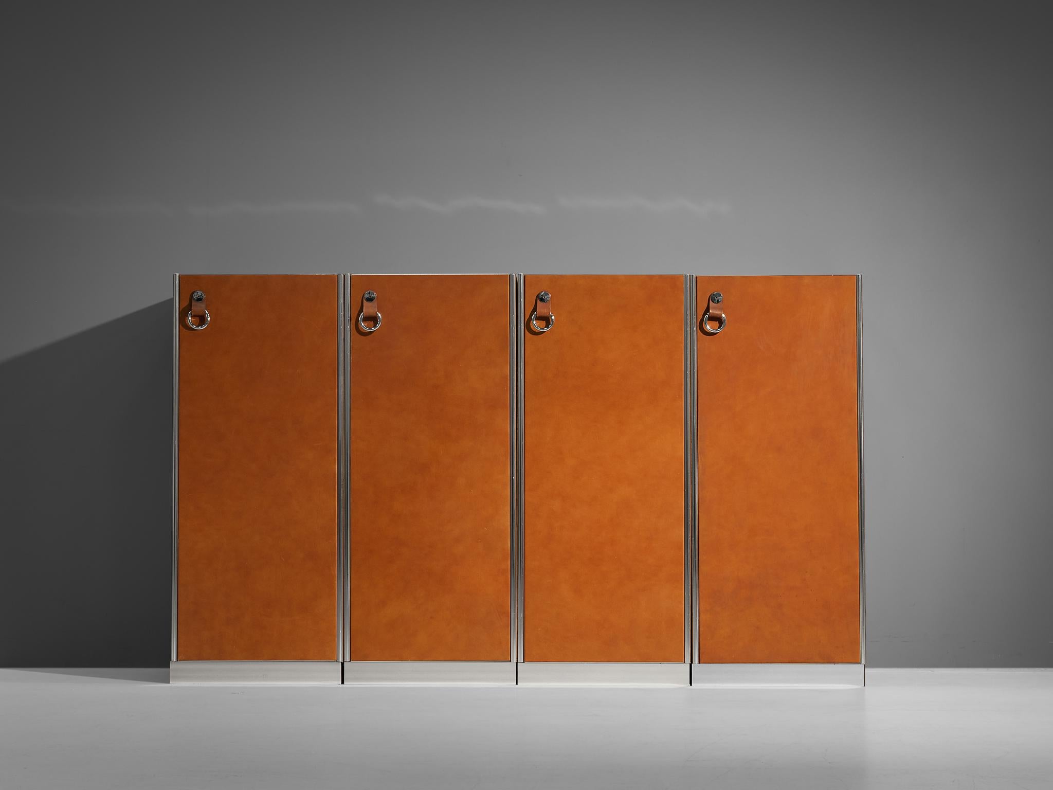 Guido Faleschini for i4 Mariani, ‘Pace Collection’ set of four cabinets, leather, chromed steel, lacquered wood, felt, Italy, circa 1975 

This eccentric set of four cabinets are designed by the creative Italian designer Guido Faleschini as part