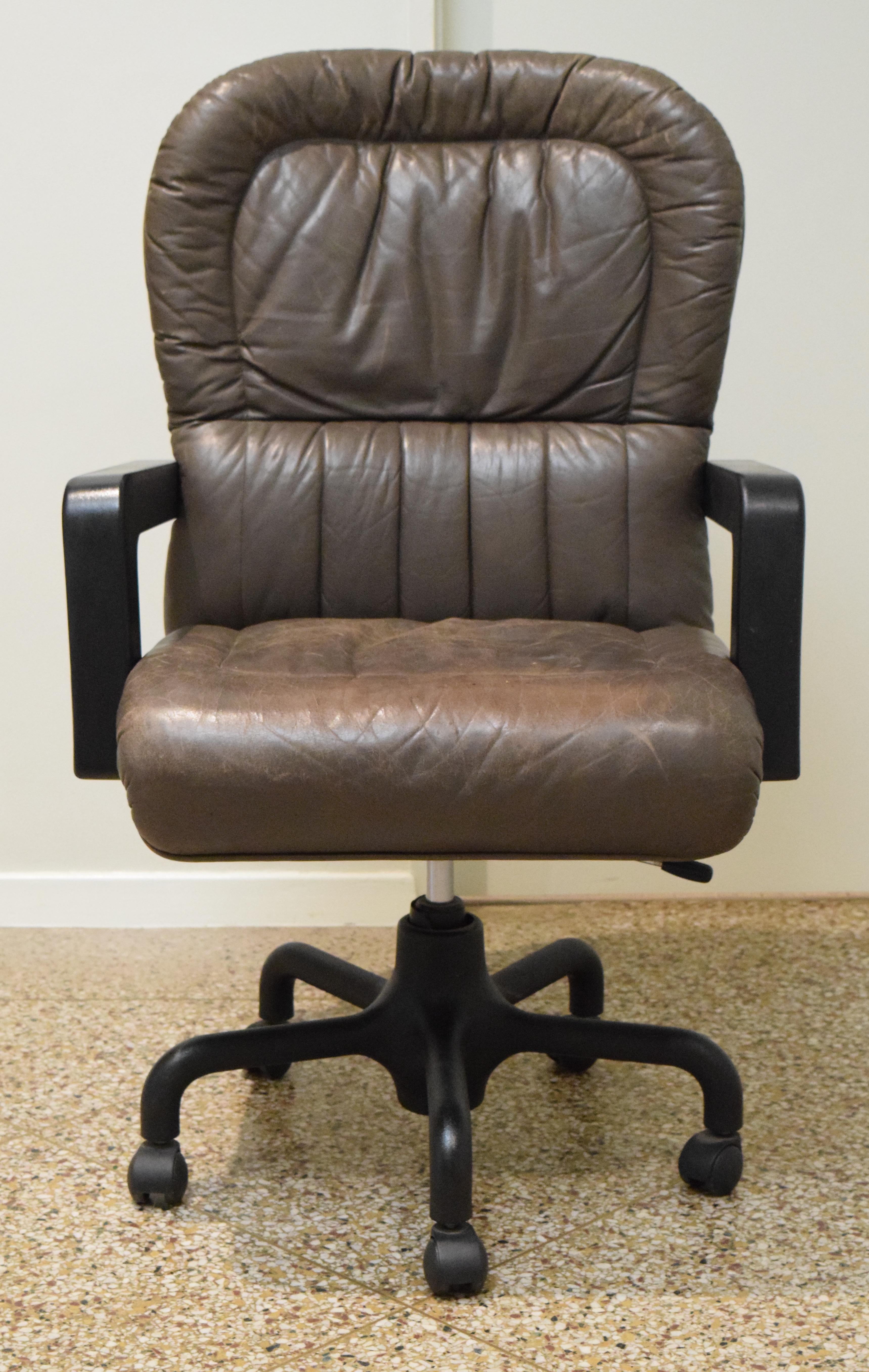 Store closing-- last day is 7/31. Offers welcome! Vintage leather office chair by Guido Faleschini at i4 Mariani for Pace collection. Exceptionally comfortable. Height is adjustable.