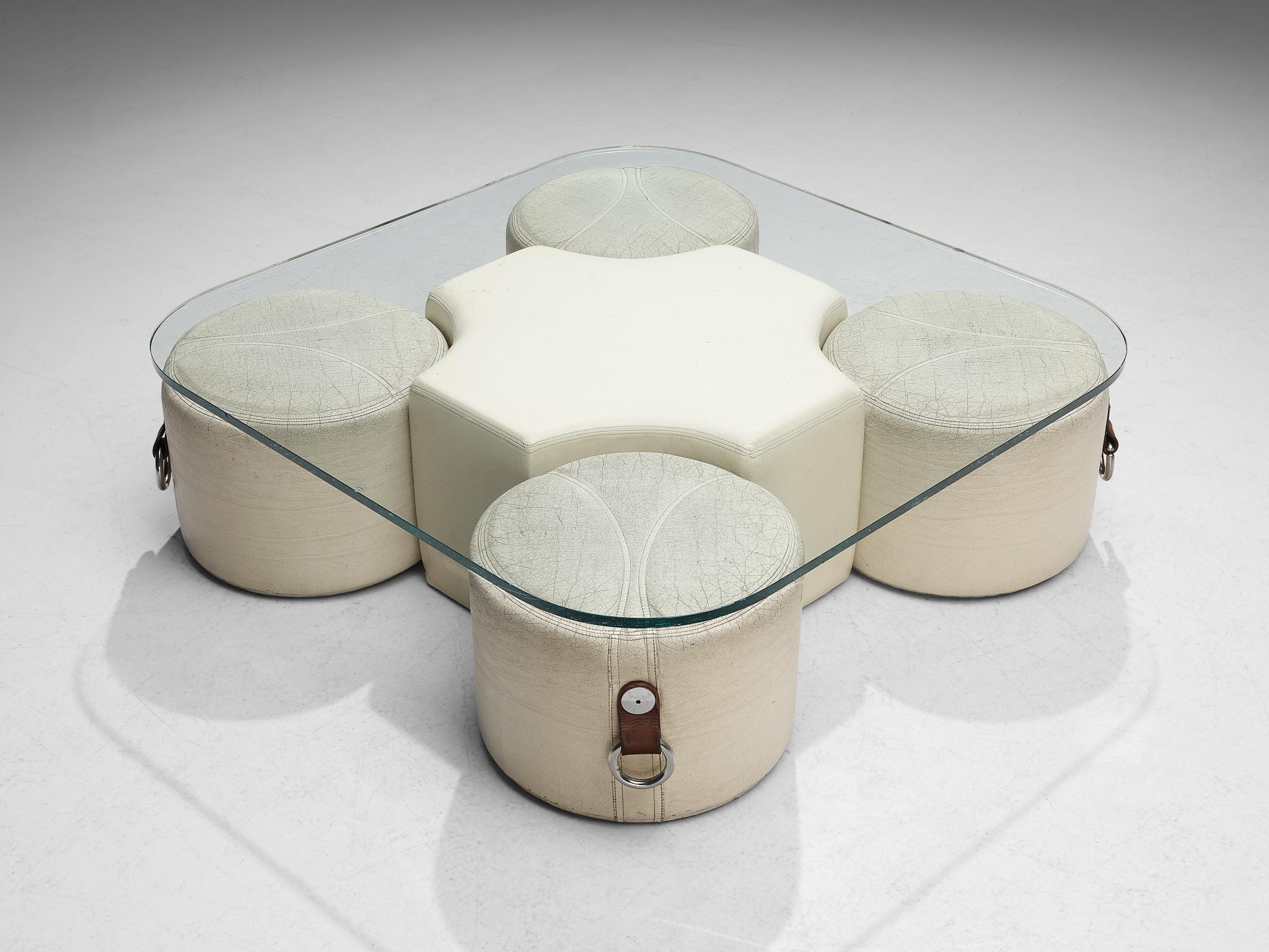 Guido Faleschini, set of coffee table and four stools, leather, glass, chromed metal, Italy, 1970s

This unique set of one coffee table and four stools is designed by the creative Italian designer Guido Faleschini. This set truly exudes the bright