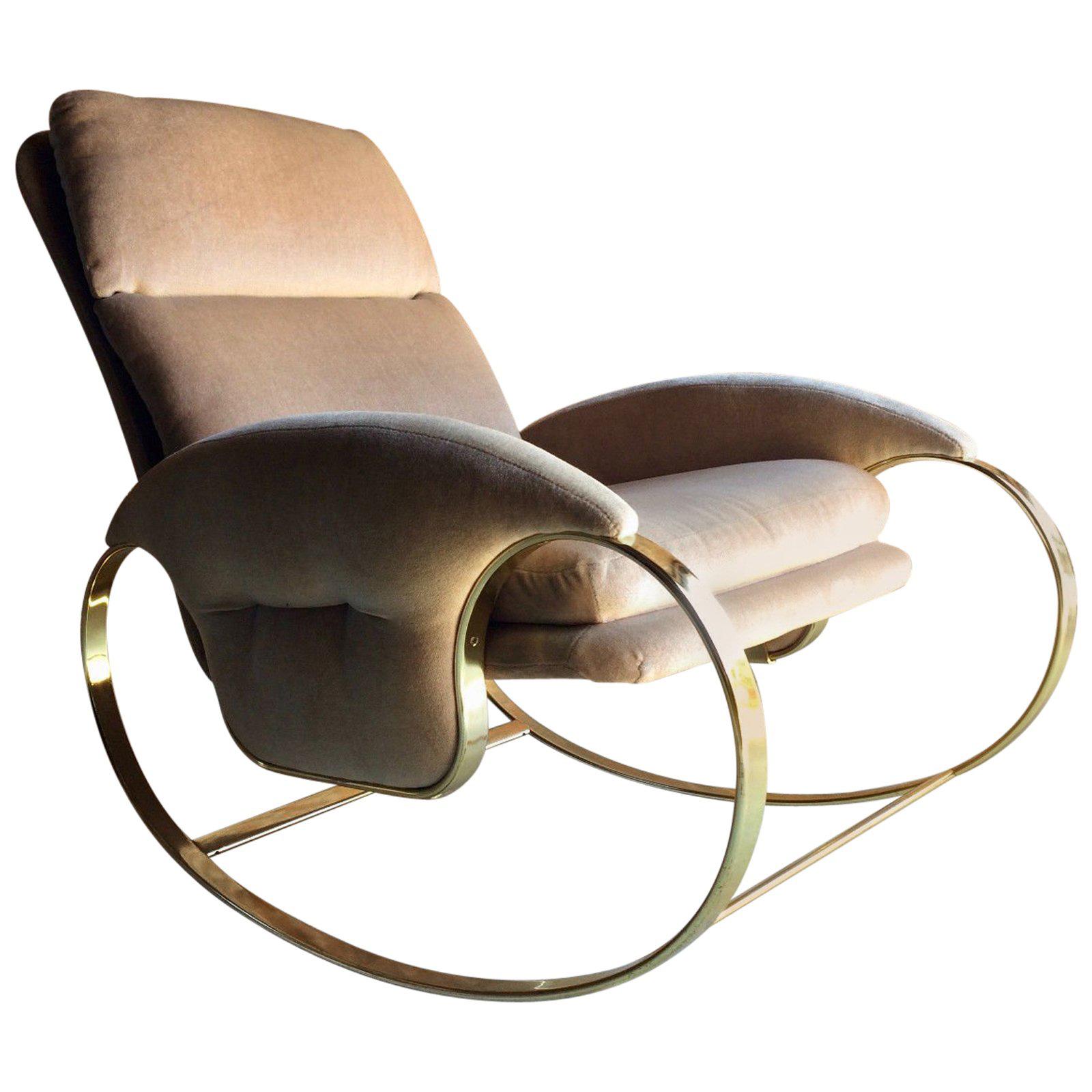 A stunning iconic 1970s Italian design Guido Faleschini gilded rocking chair, armchair, raised on stunning scroll worked frame with beige velour upholstered seat and backrest, the chair is offered in superb condition.