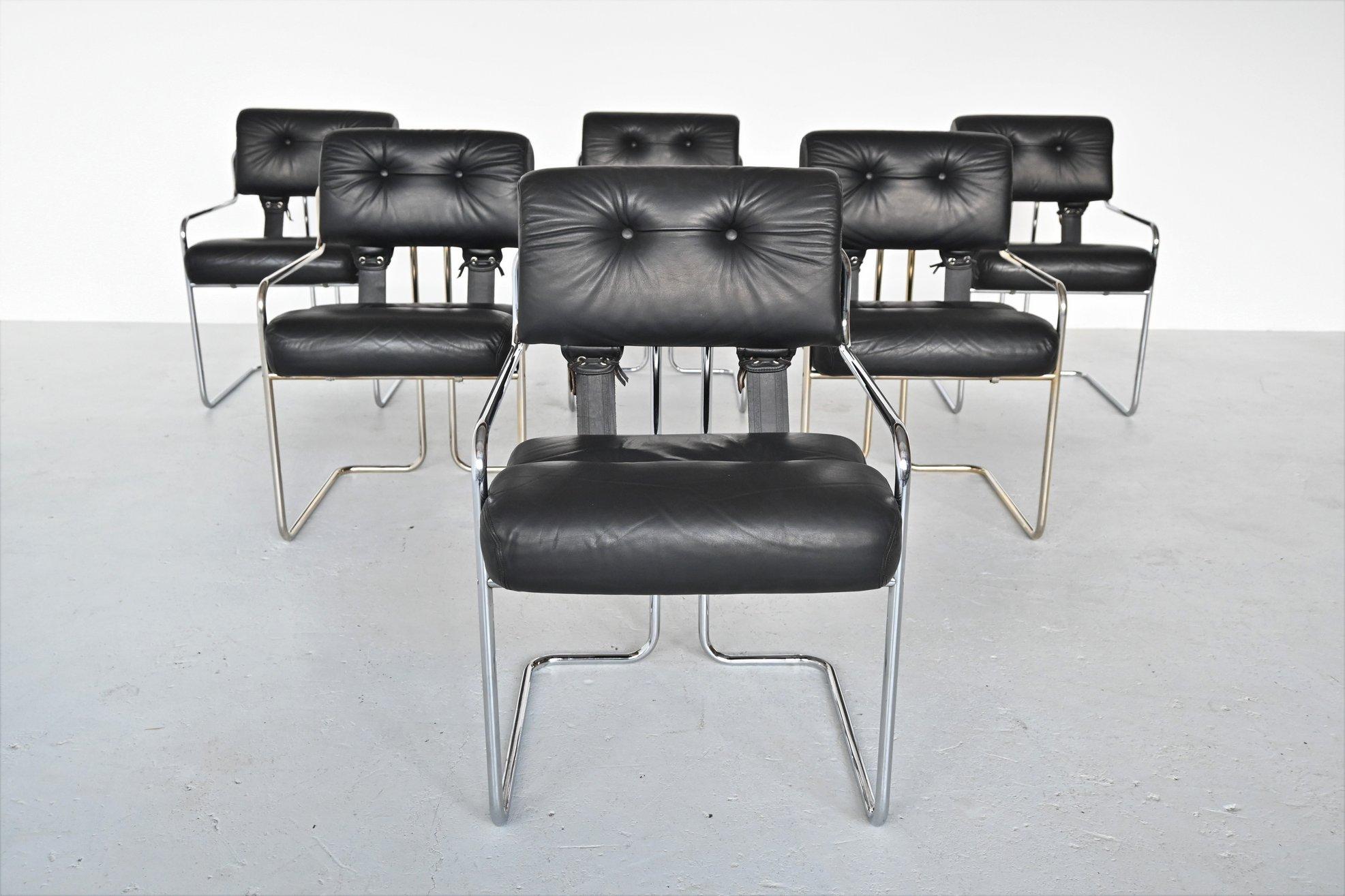 Fantastic set of 6 Tucroma dining armchairs designed Guido Faleschini for i4 Mariani, Italy 1970. These beautiful shaped chairs are hard to find in a set of 6. They have a chromed tubular metal frame and a padded leather seat and back that are