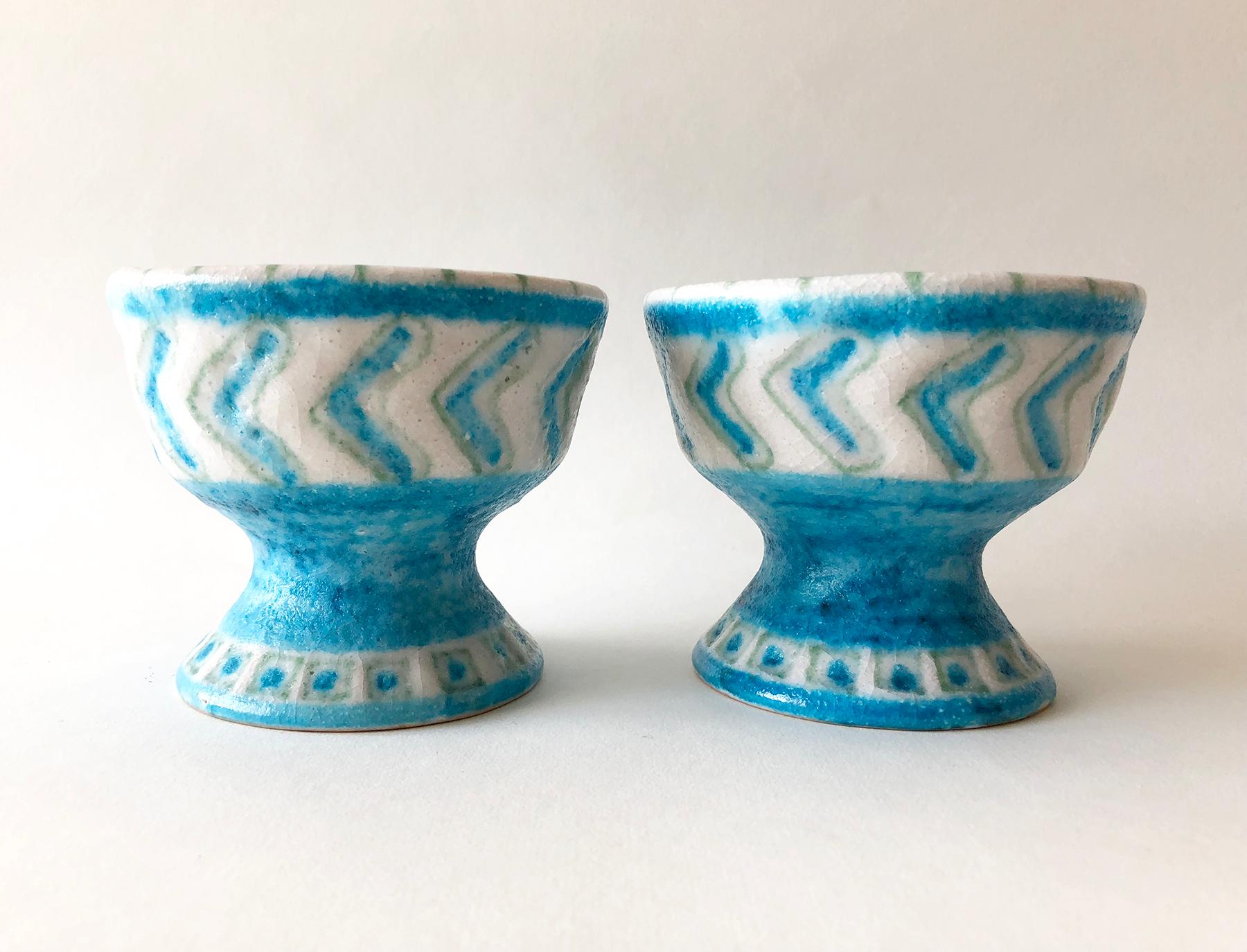 1950s candleholders with foamy glaze created by master ceramist and sculptor, Guido Gambone of Florence, Italy. Candleholders measure 3.5