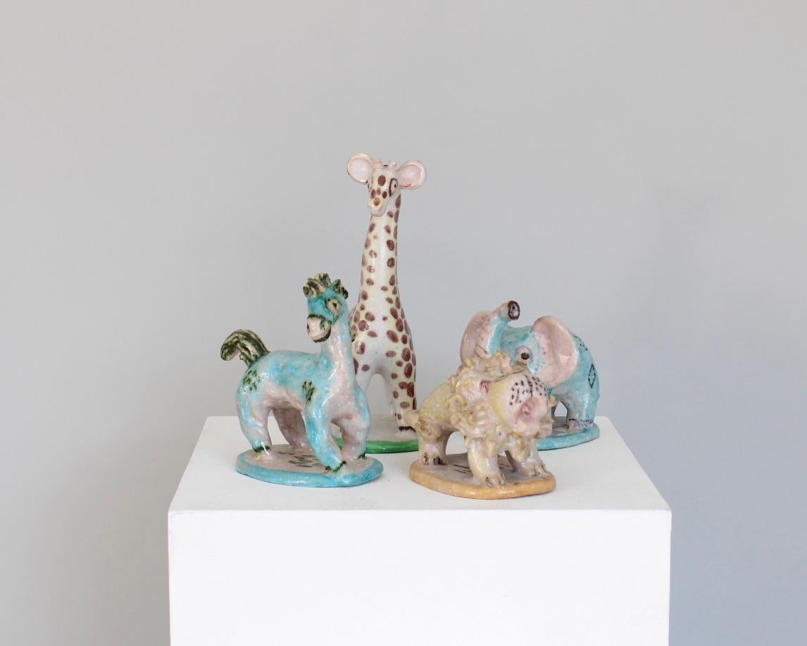 Charming set of ceramic animal sculpture figurines from the great master and innovator of Modern Italian Ceramics, Guido Gambone. 
Signature and famous donkey mark on bottom of each piece.
All in perfect condition with clear signatures on