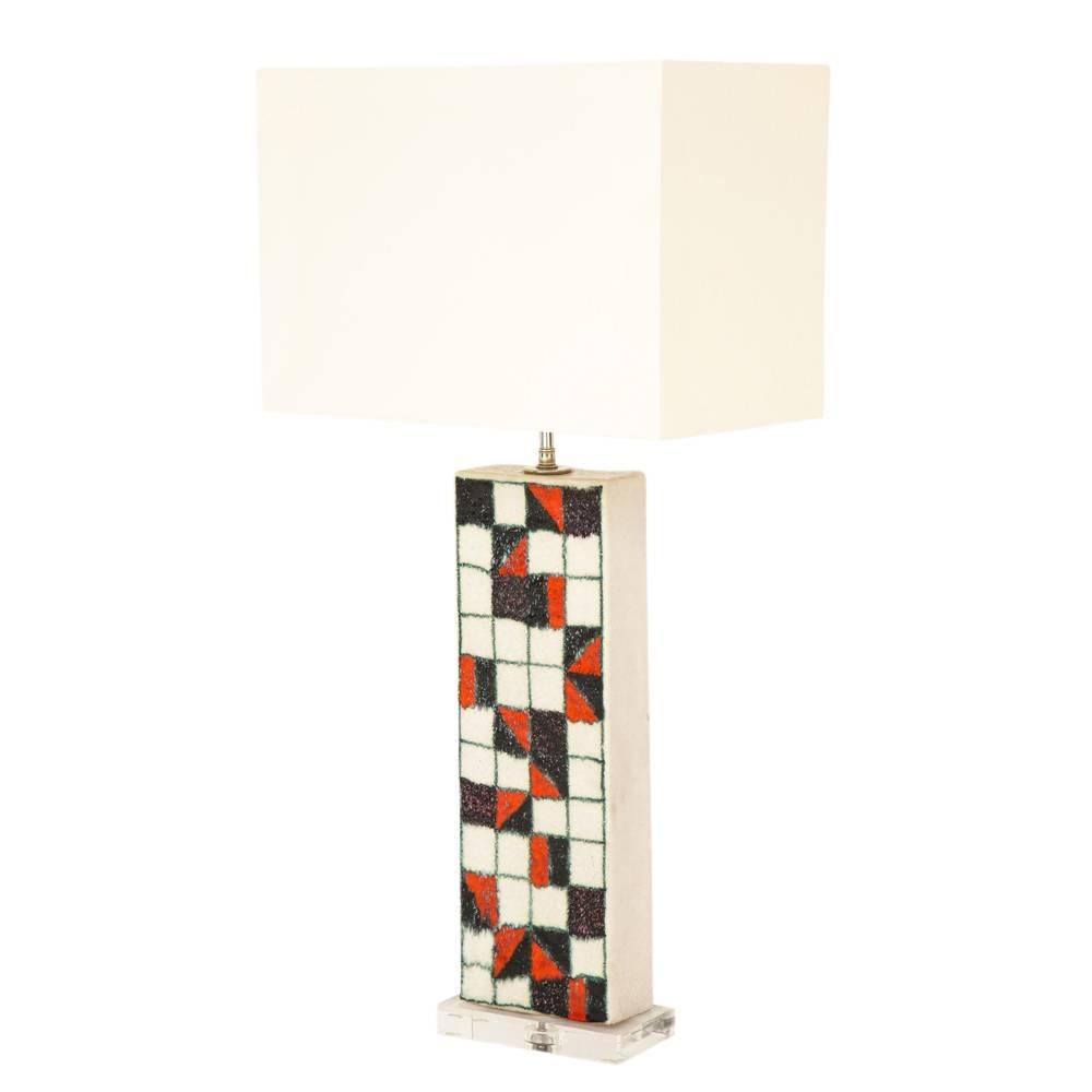 Guido Gambone lamp, ceramic, patchwork, geometric checks, red, black, signed. Medium scale rectangular glazed stoneware lamp, decorated with black, red, and white squares and outlined in light green. The ceramic body measures 18 inches. Signed: