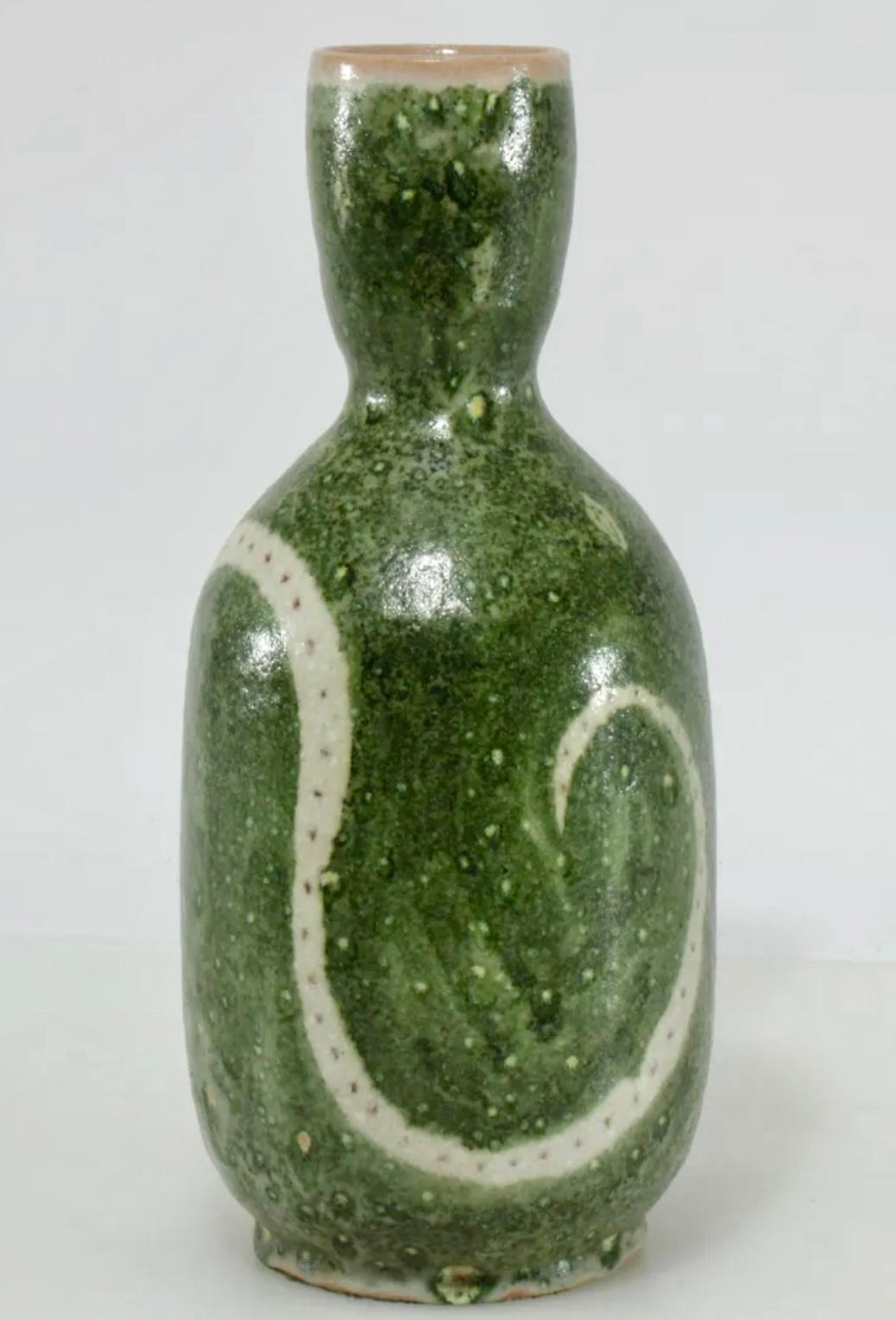 Guido Gambone green snake vase, 1950s, Mid-Century Modern ceramic vessel, Italy. Guido Gambone (Italian, 1909 - 1969) Green and white snake design ceramic vase. Signed (Signature and donkey) on bottom. Stunning piece with gorgeous, rare green glaze