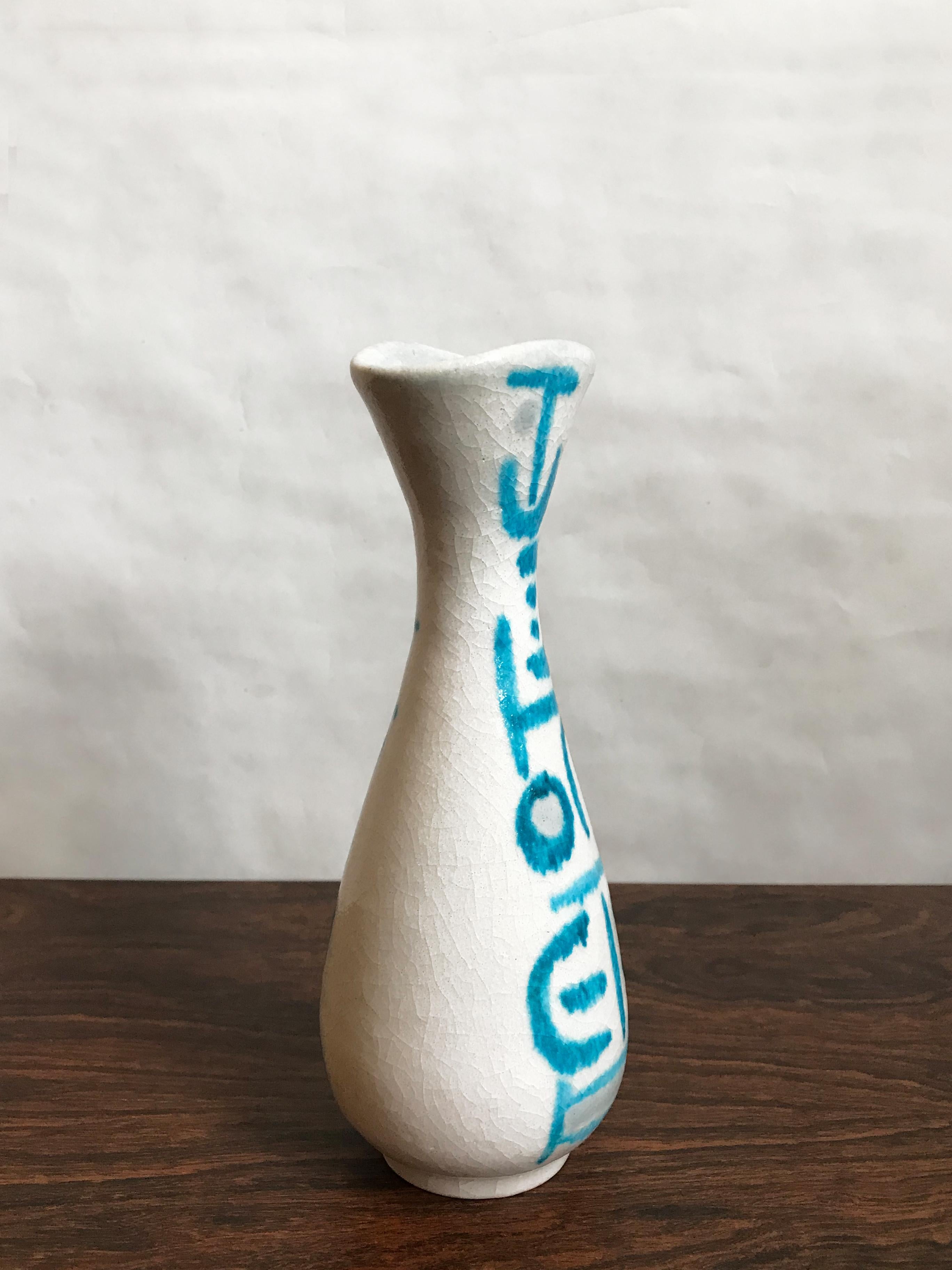 Italian midcentury ceramic glazed vase designed by Italian artist Guido Gambone decorated with an abstract drawing and signature of the artist under the base, 1950s.

Please note that the item is original of the period and this shows normal signs