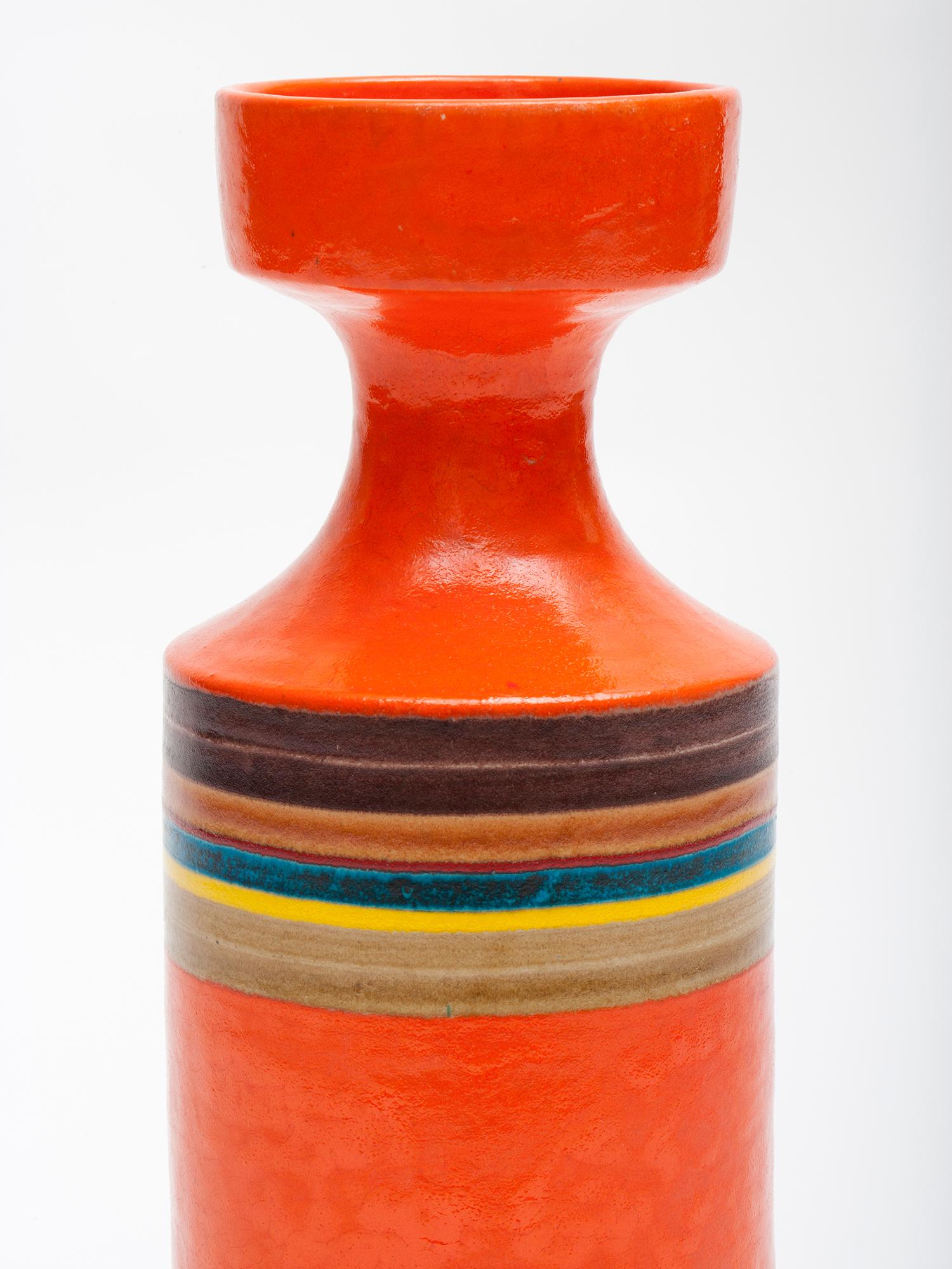 Huge, vibrant orange hand-thrown ceramic vase with colorful striped decoration in brown, yellow and blue. Signed 'Gambone Italy' on the base.