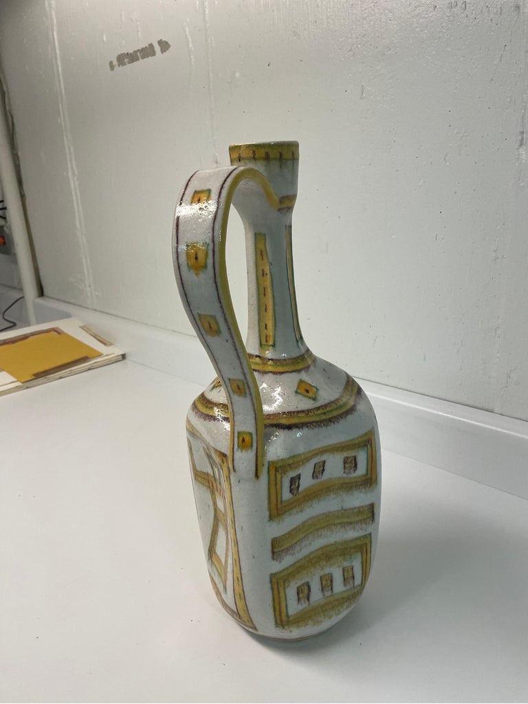 This is a large ceramic, rare pitcher by Guido Gambone. Made in Italy and in excellent condition 
Mid-century design.