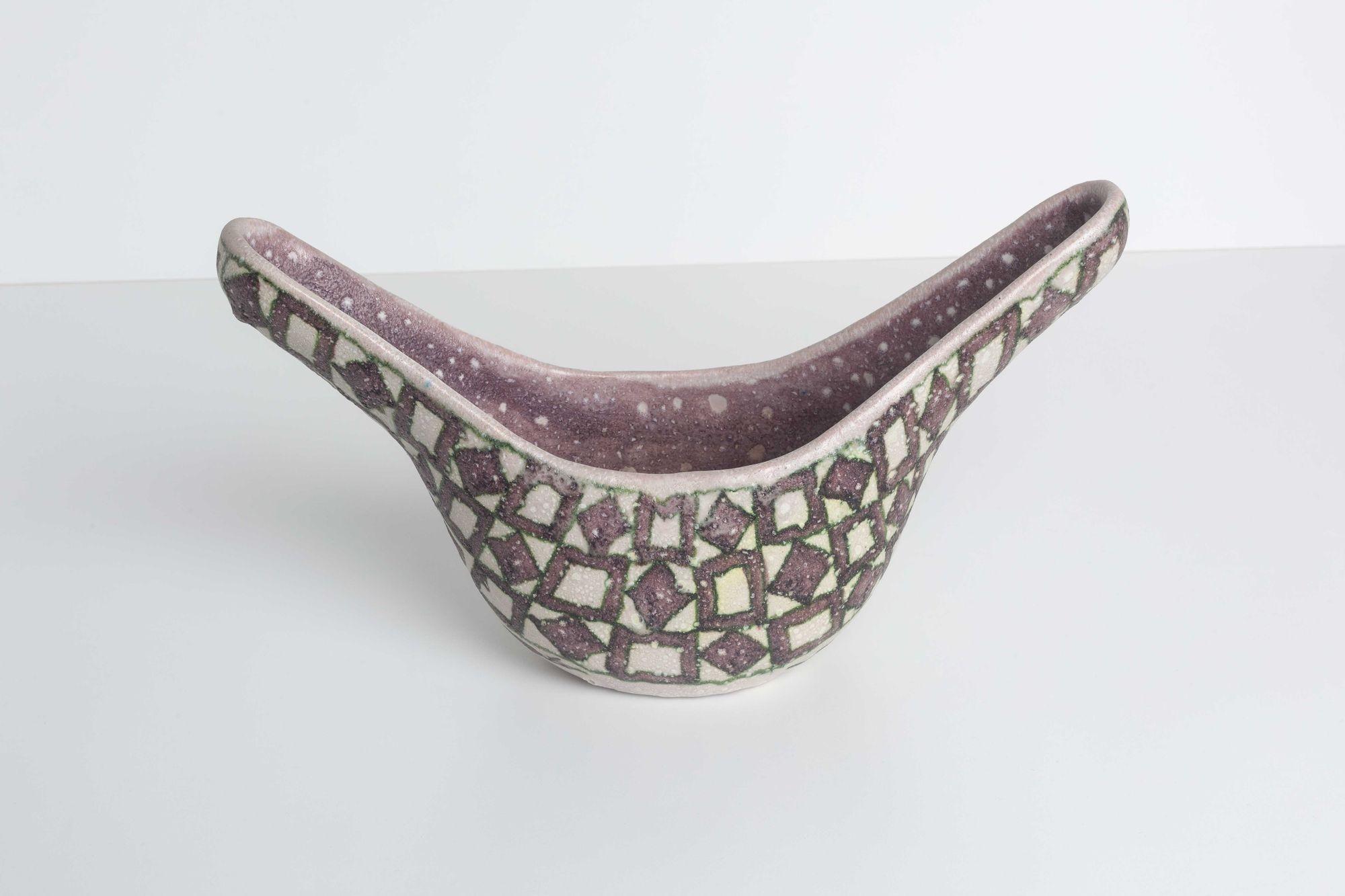 Guido Gambone Vessel Glazed Stoneware Italy, 1955c Tribal diamonds and squares in brown with green outlines
Glazed signature with donkey mark to underside: [Gambone Italy]
Dimensions:
13