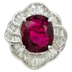 GUILD 6.19 Carat Thai Ruby Oval and White Diamond Ring in Platinum