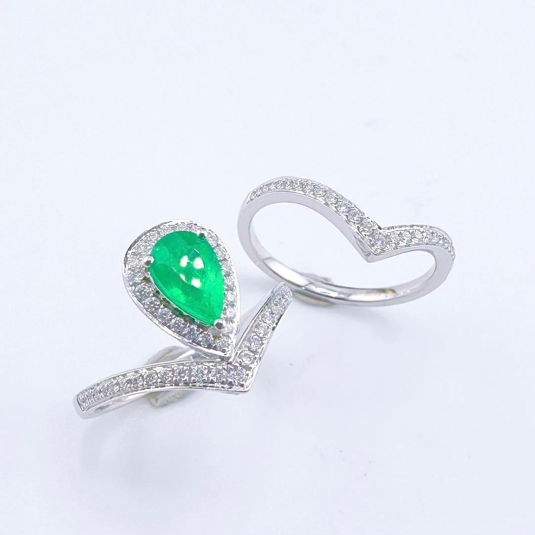 Moderno Anello con smeraldo Greene & Greene certificato Guild da 0,69 CT e diamanti in vendita