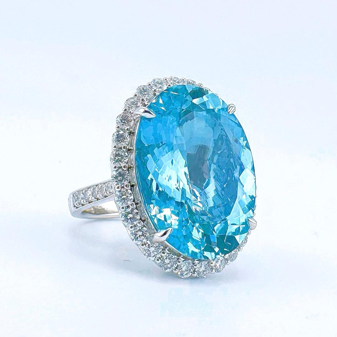 Guild Certified 20.28 CT Vivid Blue Aquamarine 18K Gold Ring with Diamonds

1 Vivid Blue Aquamarine - 20.28 CT
Guild Certification:
Modified Brilliant 
Vivid Blue ( Exceptional Santa Maria Color )

Diamonds - 1.738 CT
18K Gold - 10.32 GM

