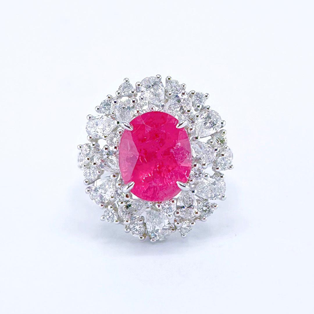 Guild Certified 3.33 CT Mahenge Spinel Diamond 18K Gold Cocktail Ring

1 Spinel - 3.33 CT
Shape - Oval
Cut - Modified Brilliant
Color - Hot Pink

Guild Certification Attached

Diamonds - 1.935 CT
18K Gold - 8.17 GM