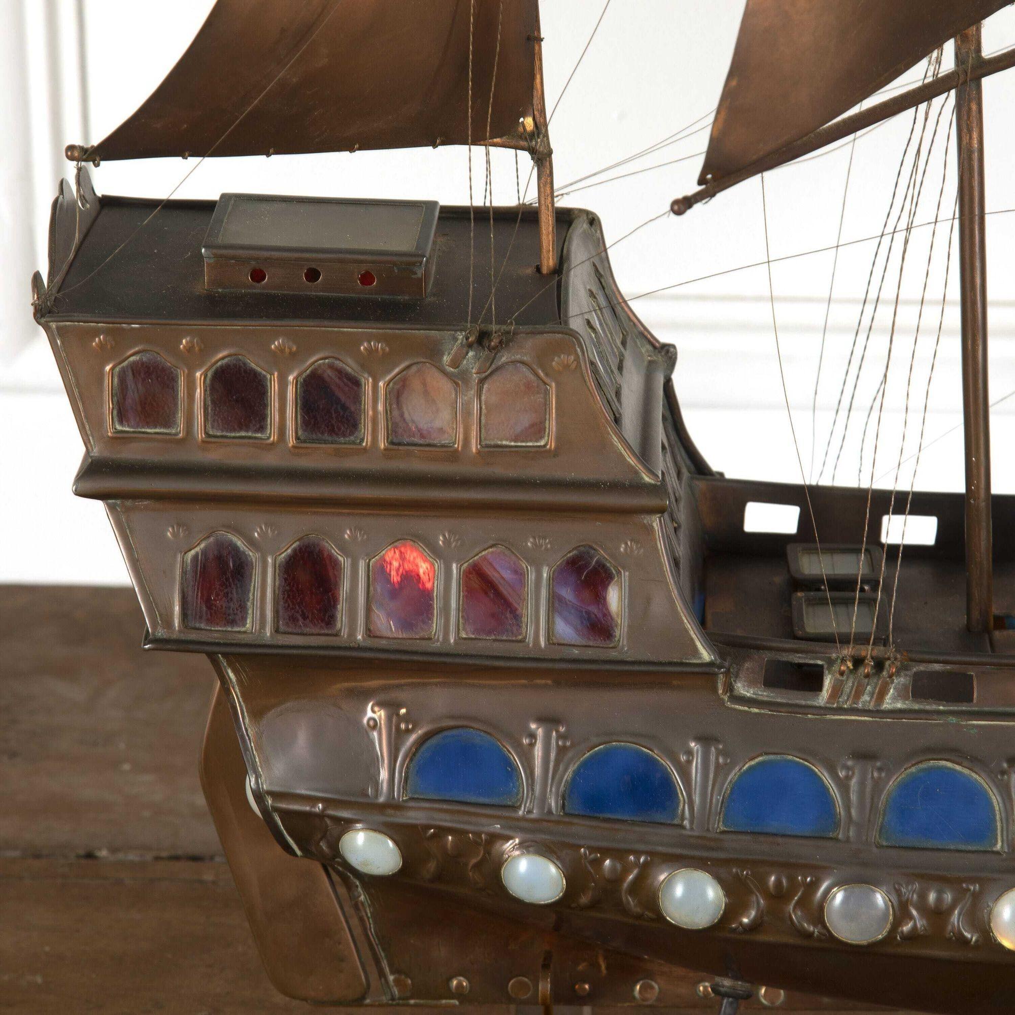 Extraordinary copper galleon, attributed to the Guild of Handicraft. 
This stunning ship demonstrates how Arts & Crafts revived the decorative arts, and gave new dignity to the craftsman in the wake of industrial revolution. 
The attention to