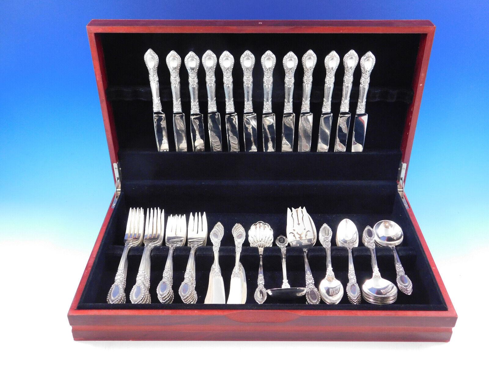 Heirloom quality Guildhall by Reed and Barton sterling silver flatware set, 76 pieces. This set includes:

12 Knives, 9