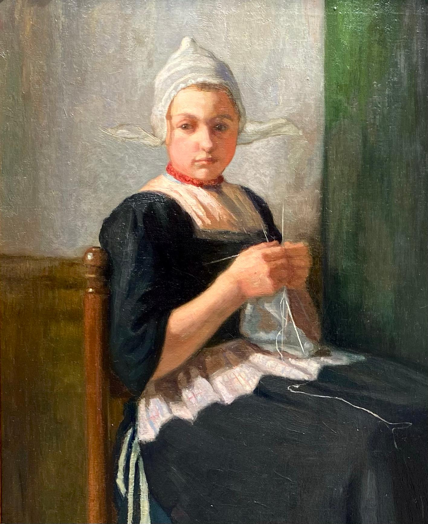Giovane ragazza che lavora a maglia