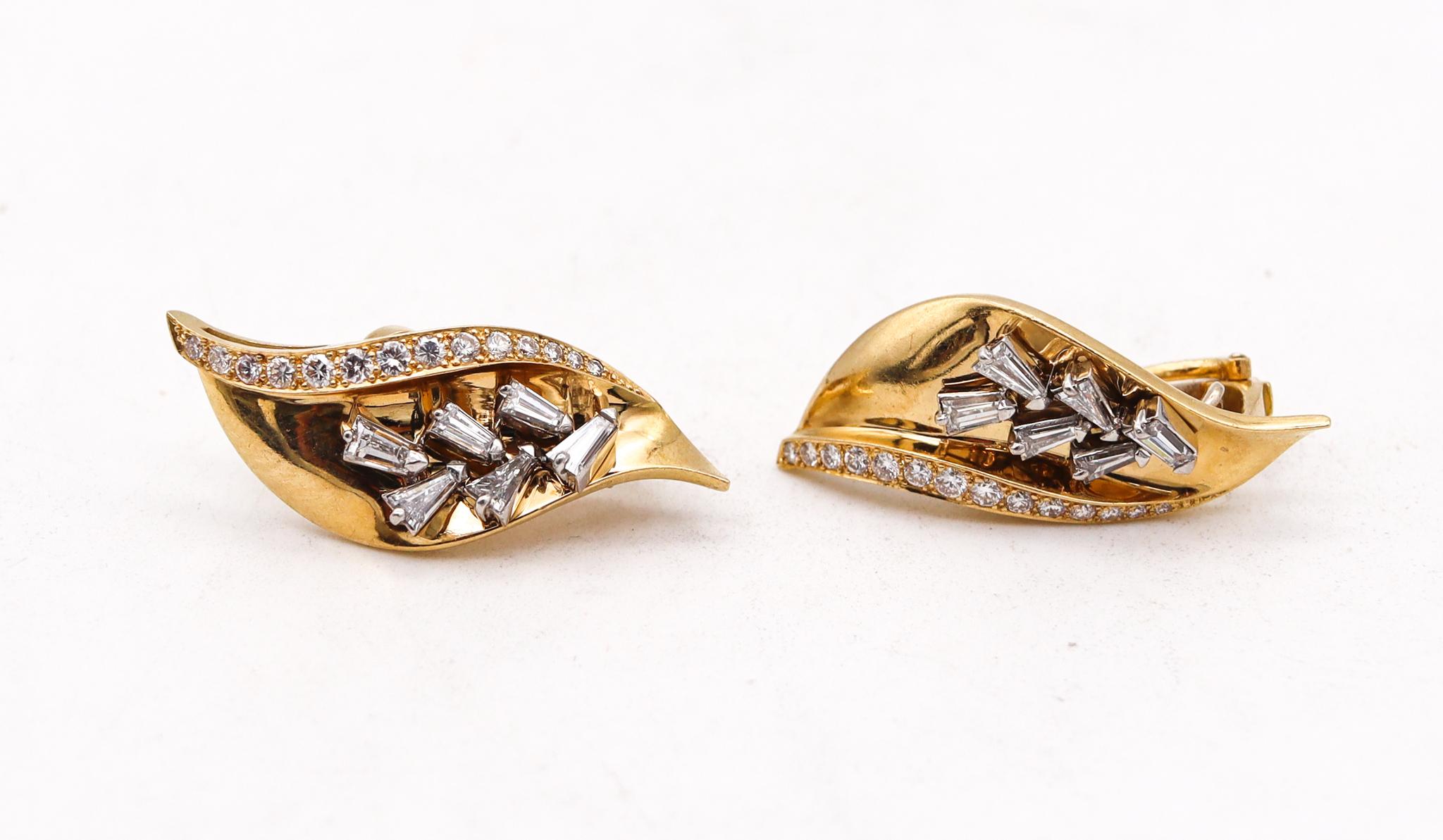 Pair of clip-on earrings  designed by Guillemin & Soulaine.

A very rare highly collectible pieces of jewelry, created in Paris France at the exclusive jewelry atelier of Guillemin & Soulaine, back in the 1970. The beautiful convertible pair of clip