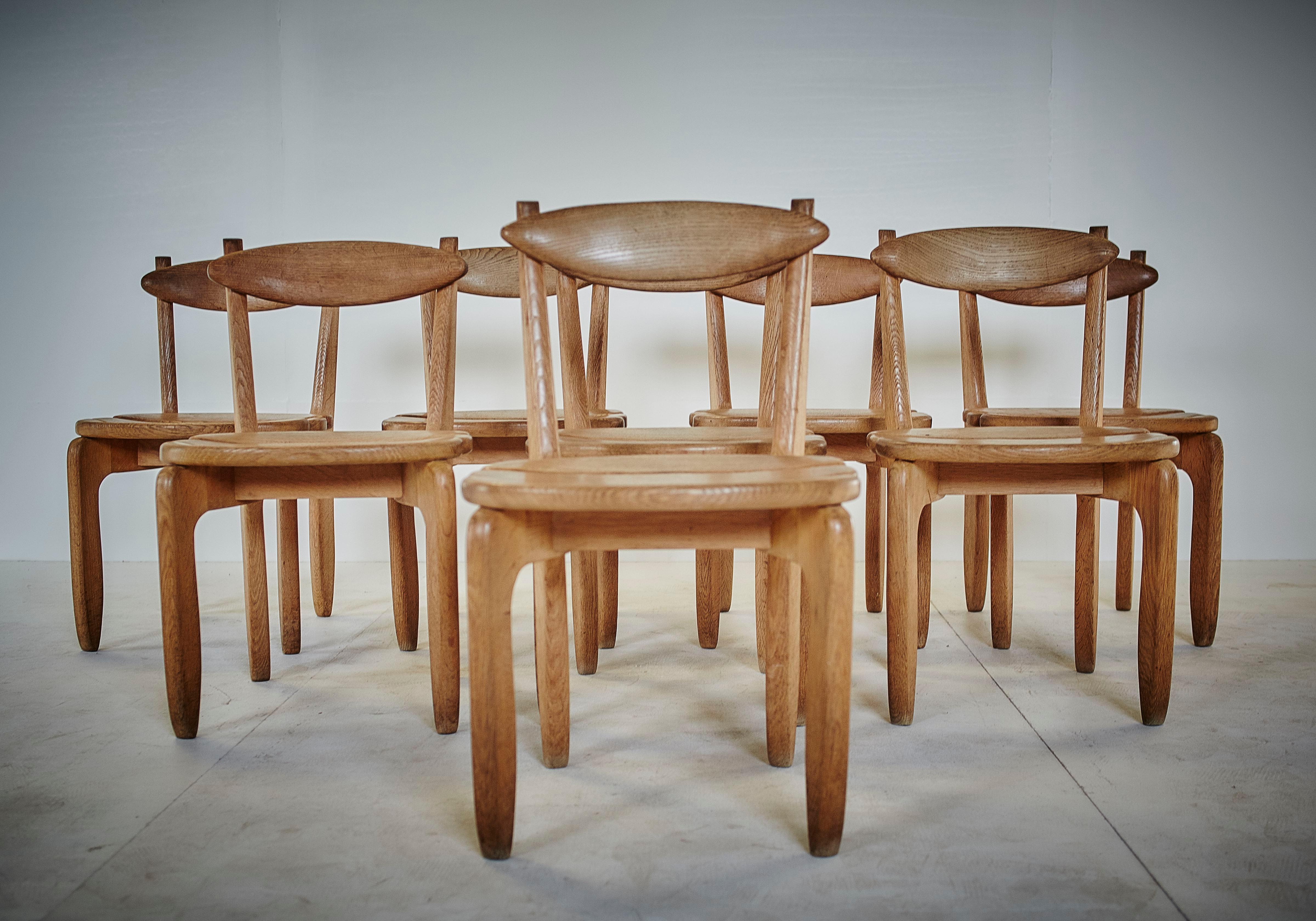 Robert Guillerme (1913 - 1990) and Jacques Chambron (1914 - 2001).
Set of eight dining chairs model 