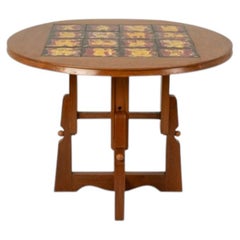 Guillerme and Chambron. Oak and ceramic pedestal table. 1970s-80s