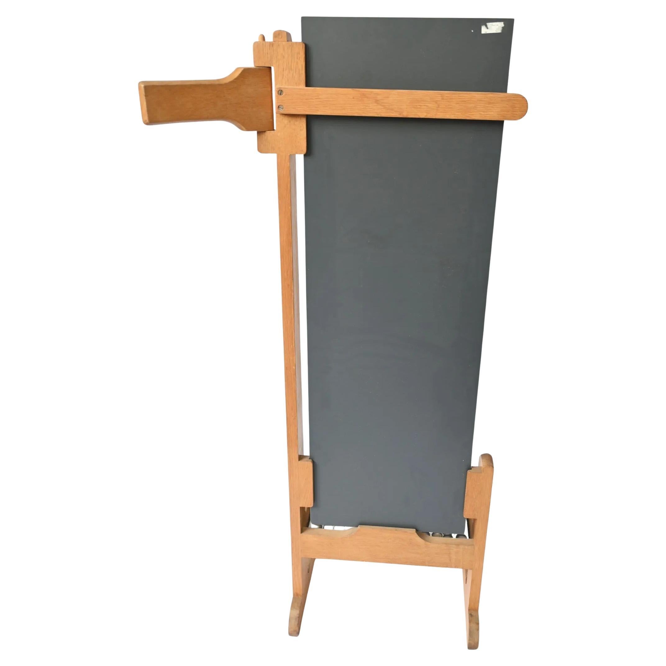 Guillerme and Chambron psyche mirror in Oak and ceramic , Edition Votre Maison 
The mirror pivots
A tile is broken
The tiles can be replaced

 Votre maison : a style, a concept, a mindset.

The Votre Maison story begins in 1940 in Prussia, near the